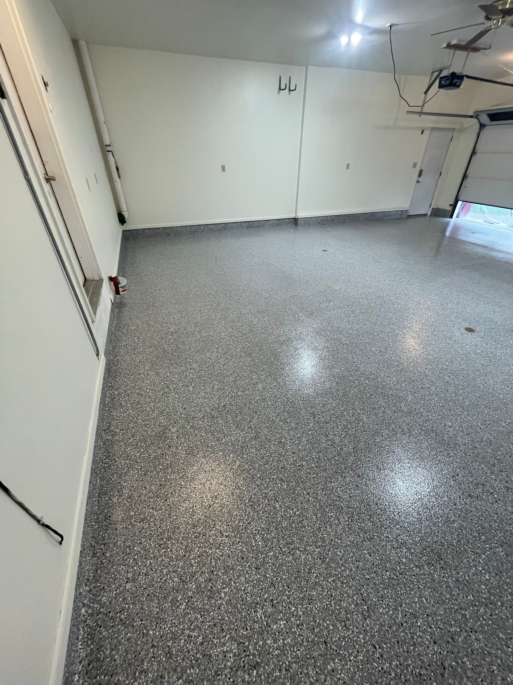 Madison Garage Concrete Coating with Feather Grey Speckle Finish by Select Painting, Coatings & Garage Cabinets