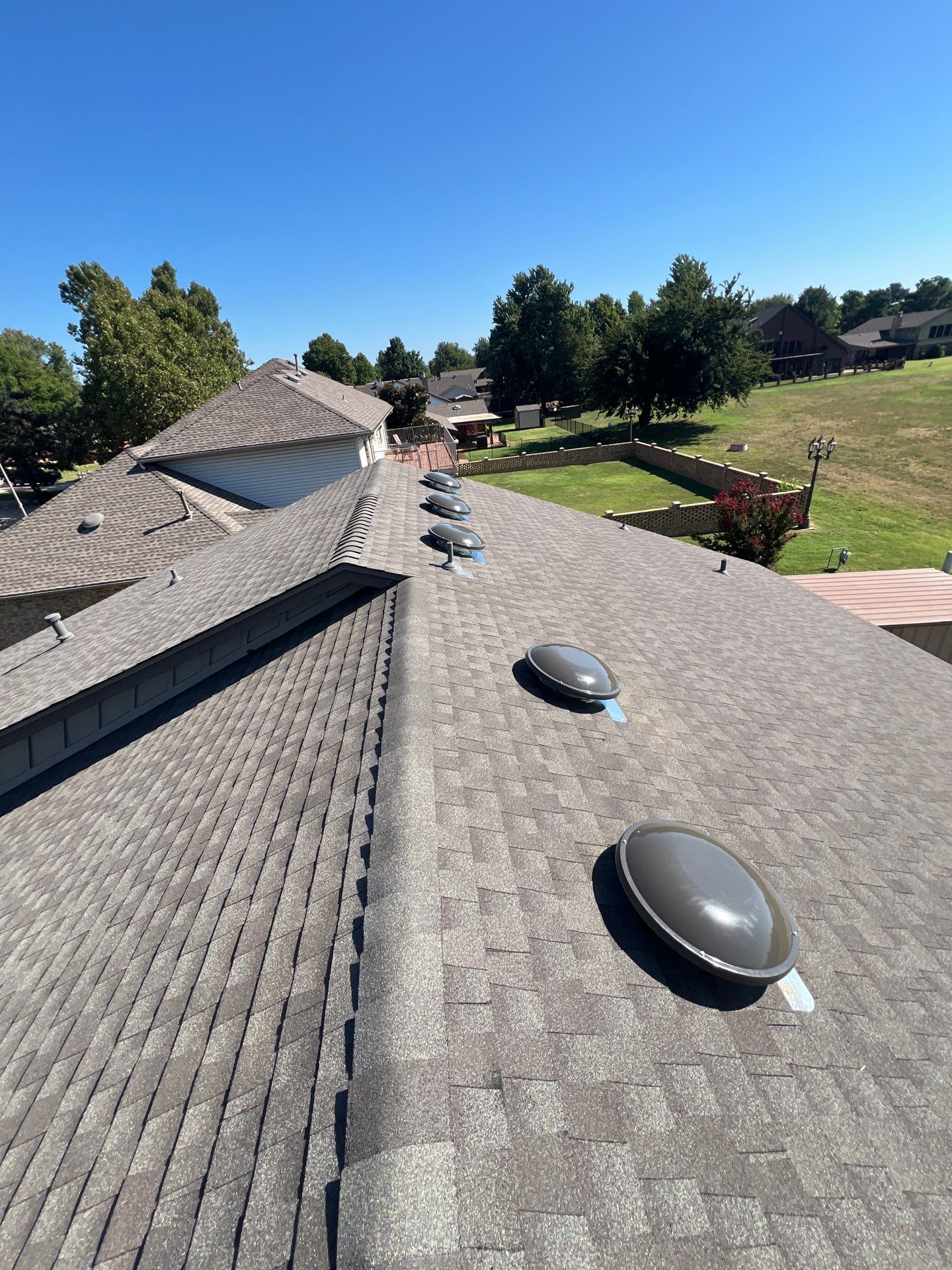 Roof Replacement and Skylight Replacement in Yukon by McCann's Roofing and Construction