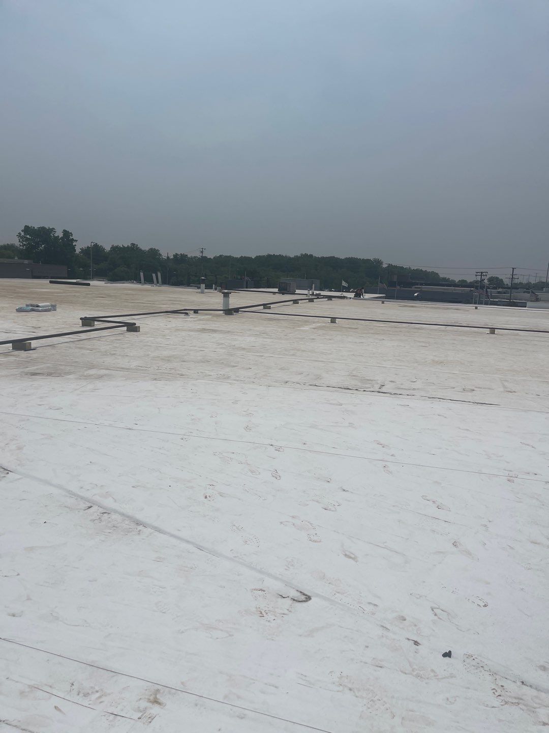 Ford Dealership - Re-Roof by Pink Roofing