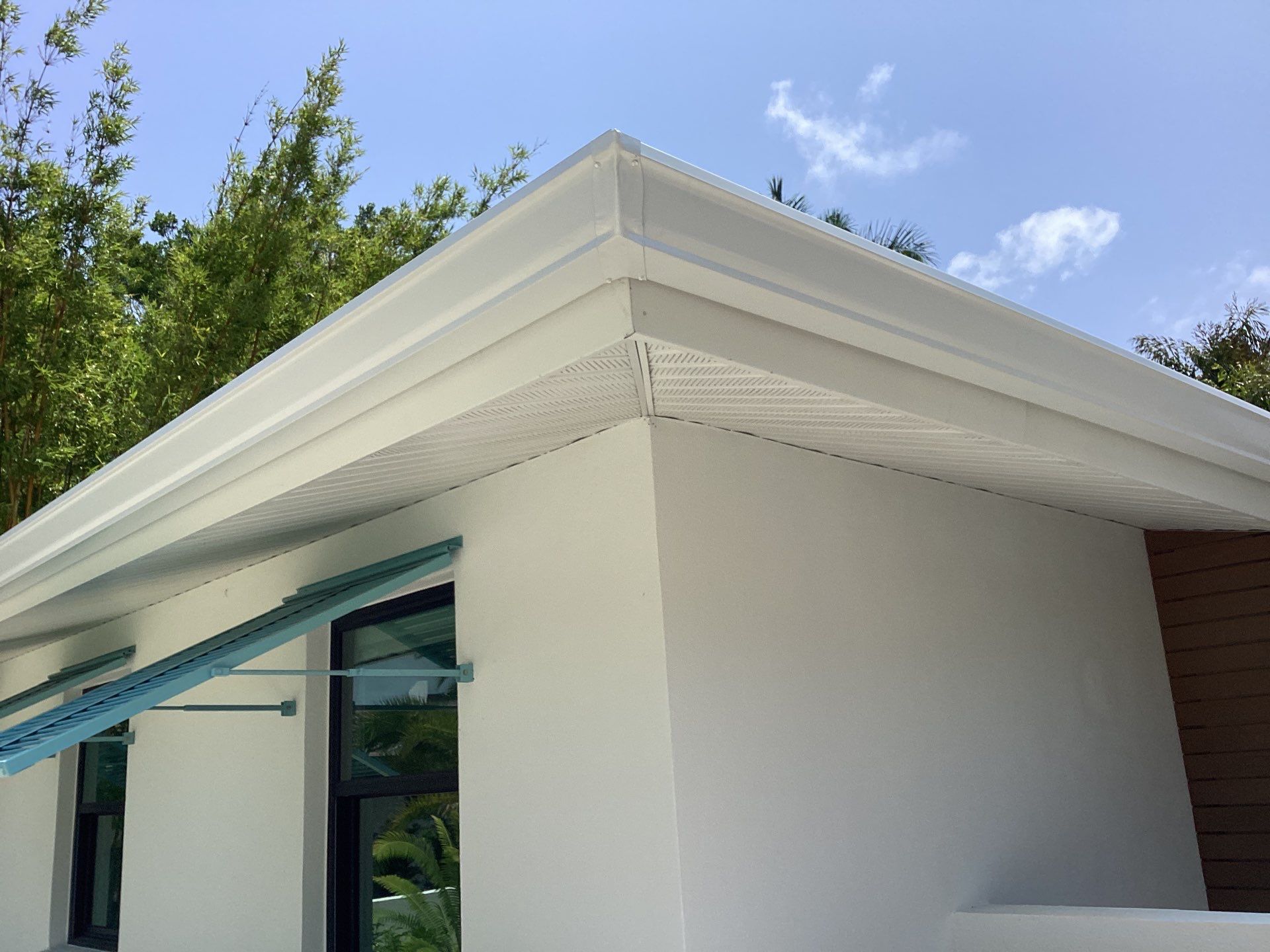 White Seamless Gutters and Downspouts in Sarasota FL by Gutter Professors