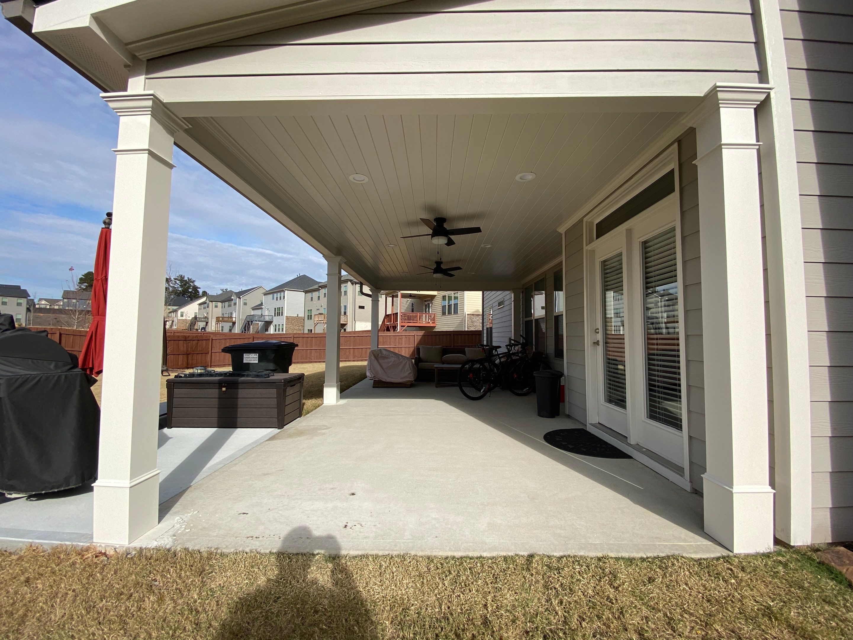Custom Covered Porch with Beadboard Ceiling in Marietta by Swift Home Renovations
