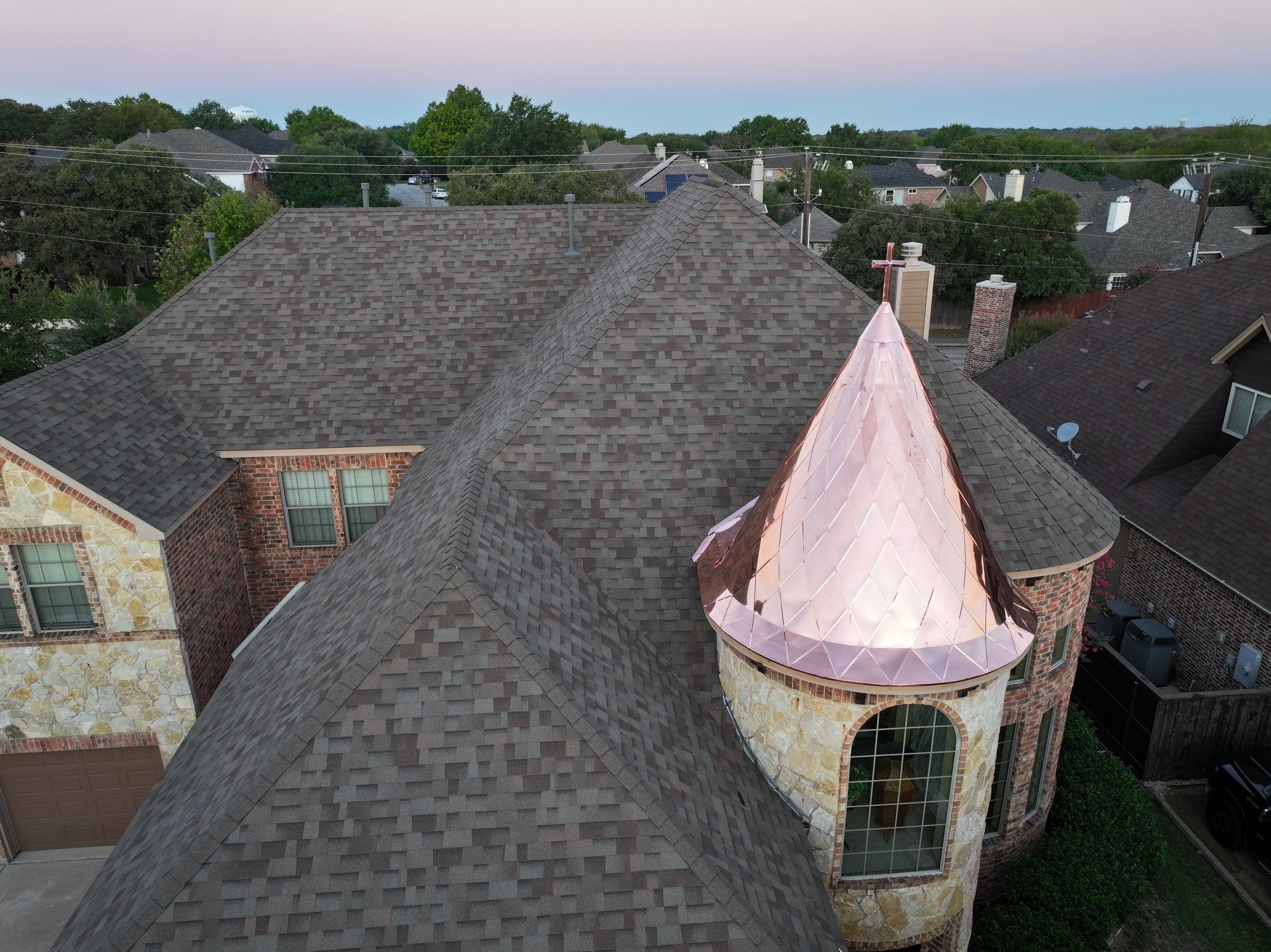 Installing Custom copper turret and Malarkey Vista Class 4 shingles Hail Damage Upgrade by Becker Roofing and Exteriors
