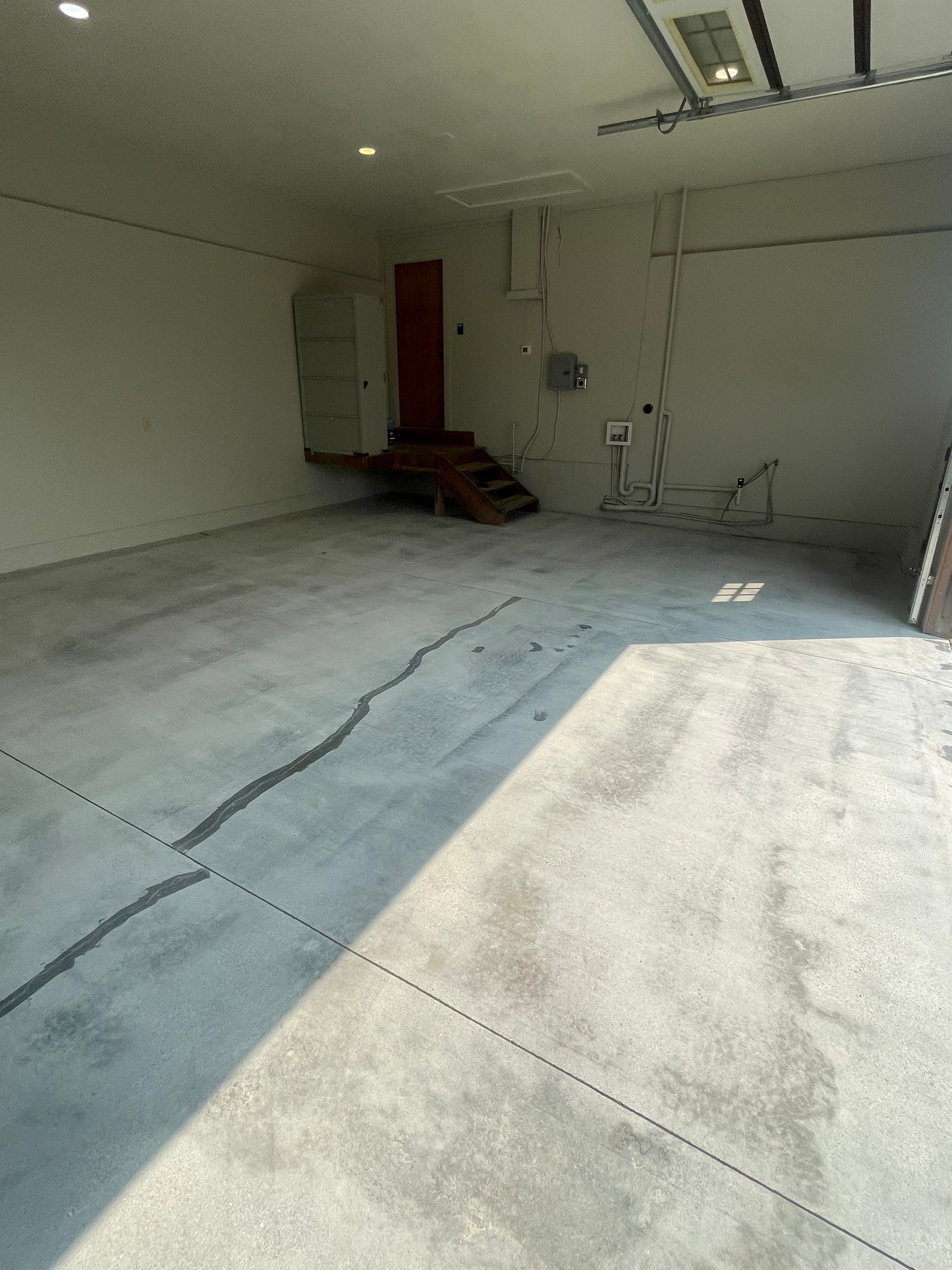 Domino Flake Floor Coating and Crack Repair in Chancellor by Select Painting, Coatings & Garage Cabinets