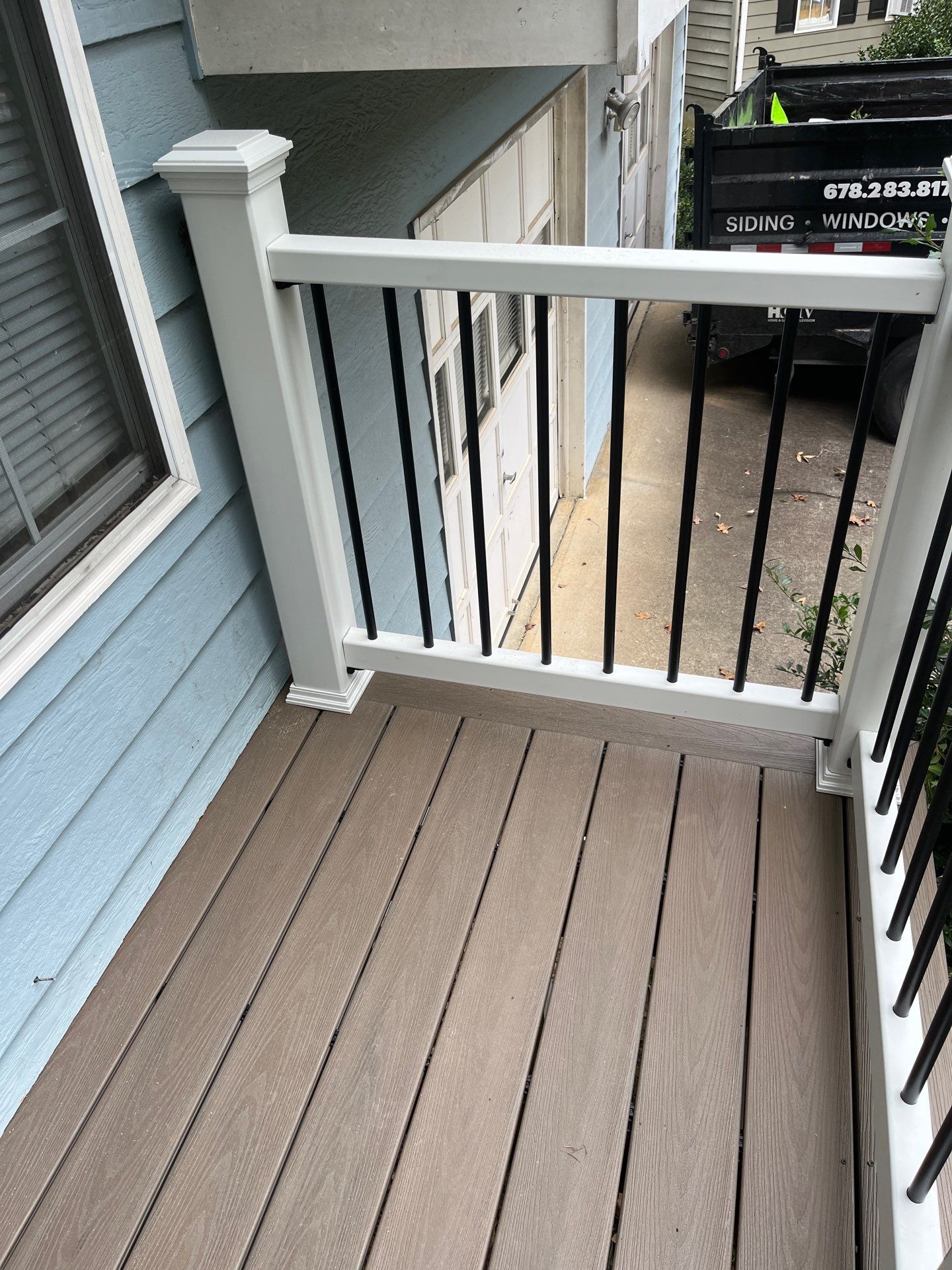 Deckorators Deck Resurface on Front Porch and Wood Deck Resurface on Back Deck by Nelson Exteriors