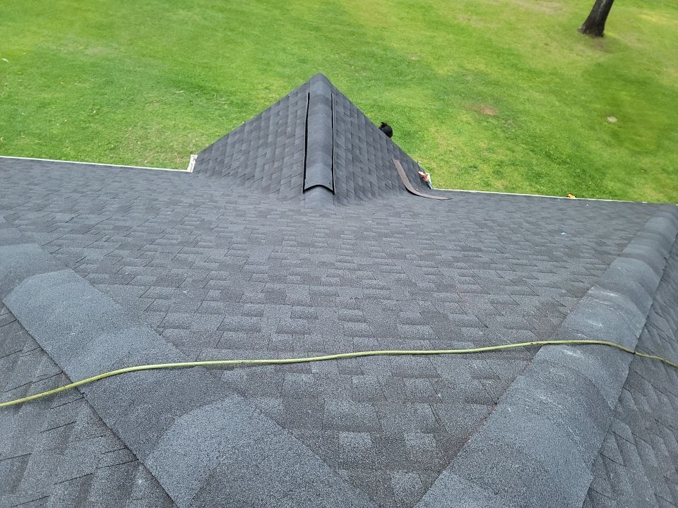 Residential Roofing Installation using Roof Replacement by American Roofing & Construction LLC
