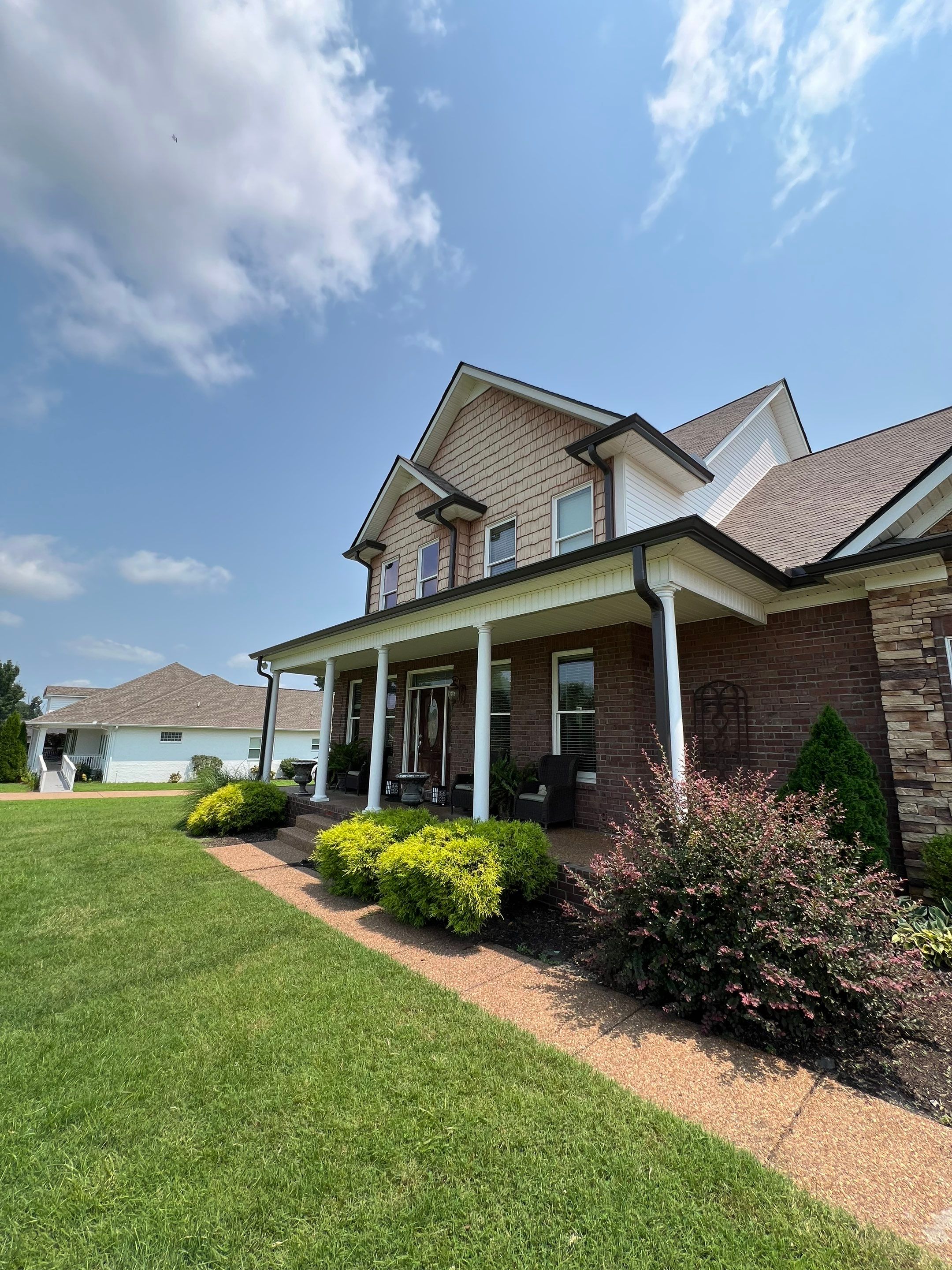 Residential Roofing Installation and Gutter Replacement in Dickson, Tennessee by Shinglesmiths Roofing
