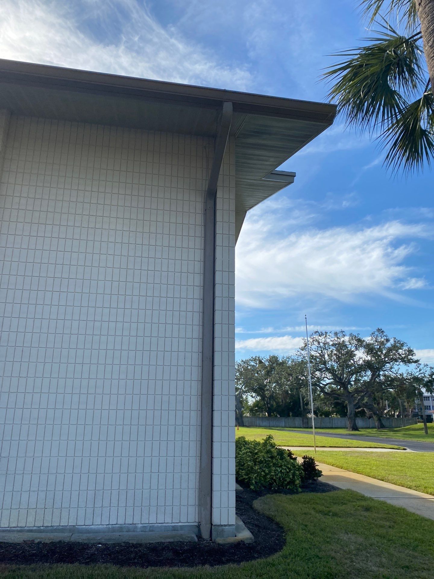 Grey Aluminum Gutters with Downspouts in Sarasota FL by Gutter Professors