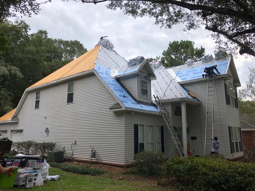 Residential Roofing Installation using Roof Replacement by American Roofing & Construction LLC