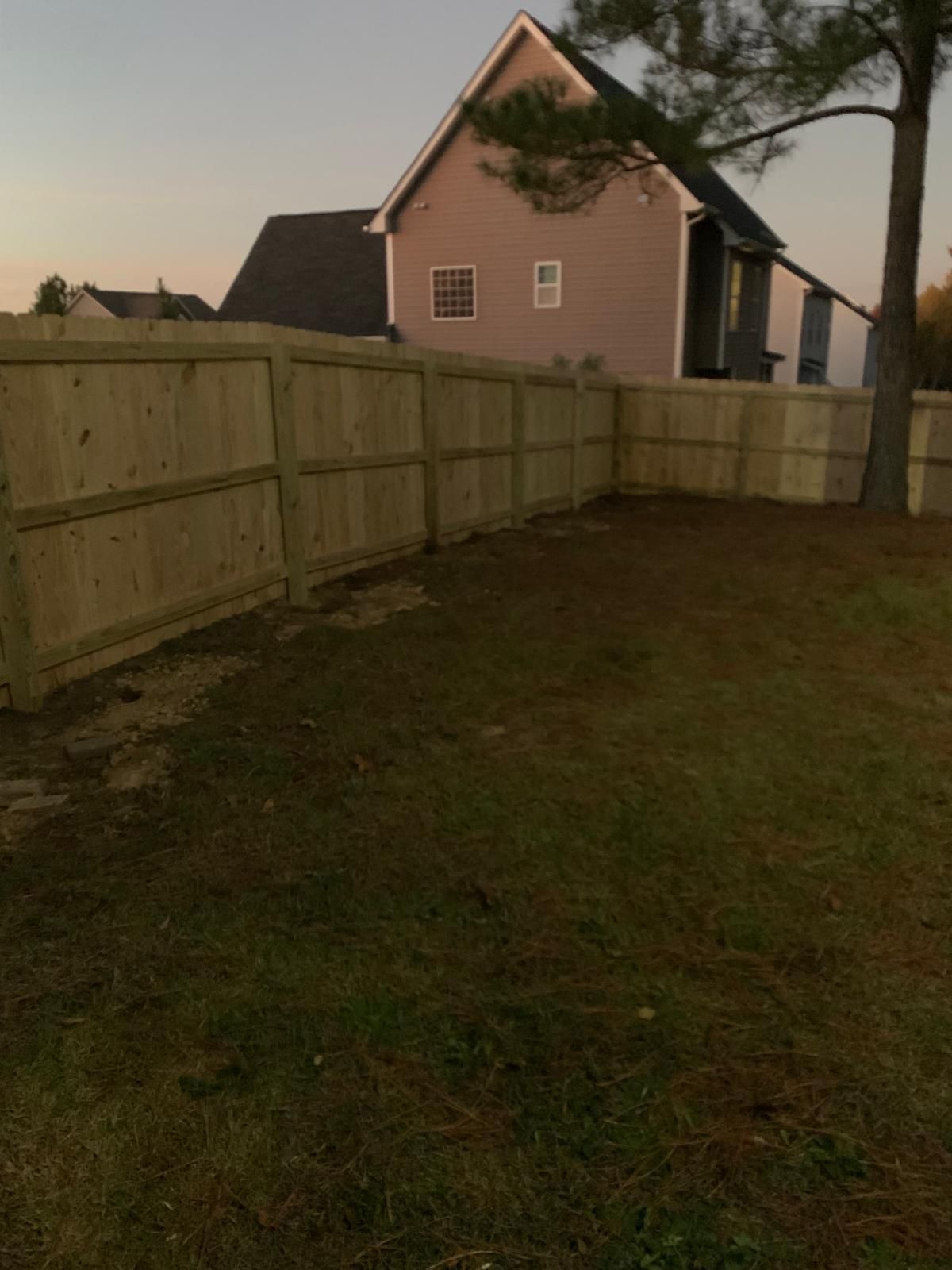 Stockade Wood Privacy Project in Cameron by Superior Fence and Rail