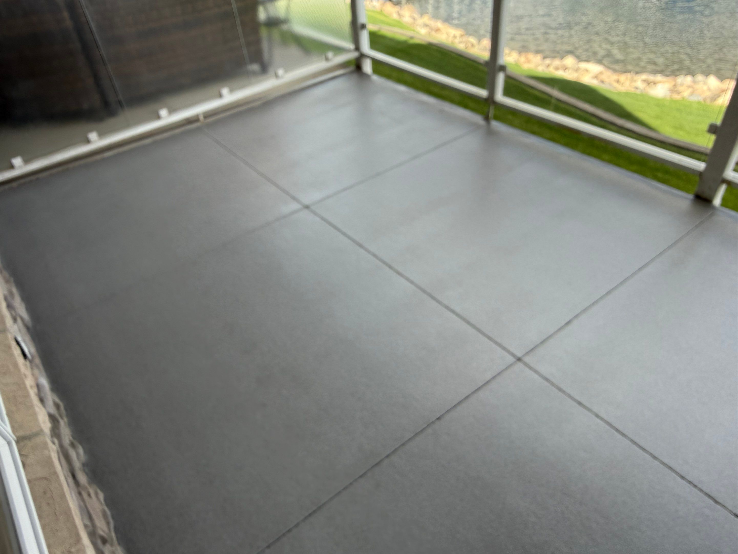 Dark Gray Slip-Resistant Concrete Coating for Arnolds Park Balcony by Select Painting, Coatings & Garage Cabinets
