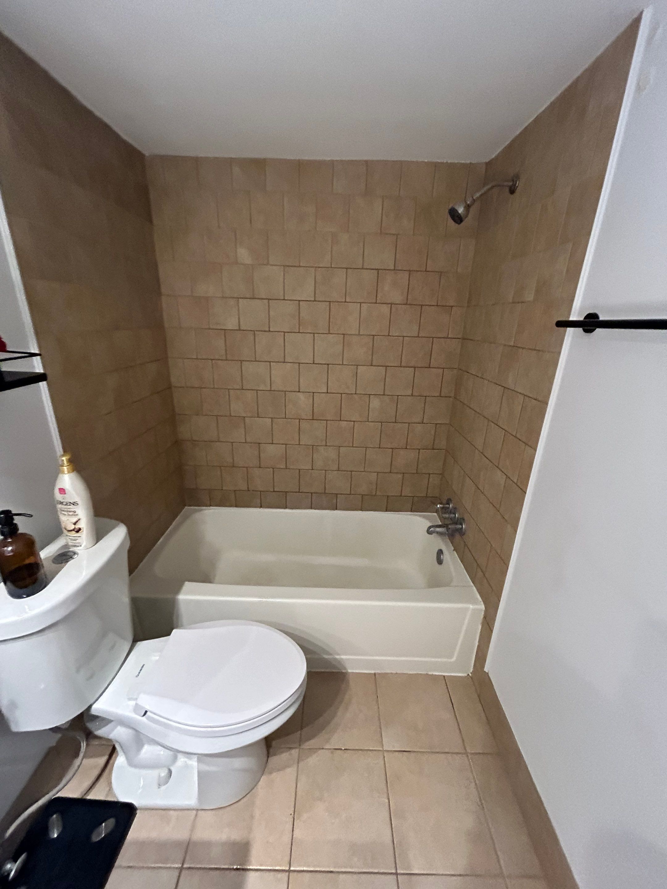 Brick pattern tiles for a bathroom and kitchen by Footprints Floors of Nashville