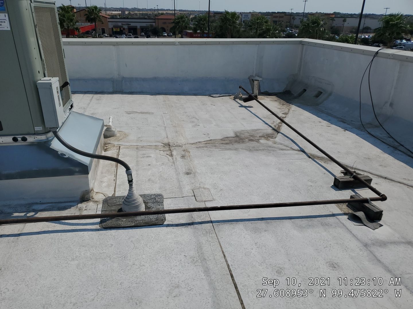 Commercial Roofing Repair using Silicon Roof Coating by JM Flores Roofing & Construction, Inc