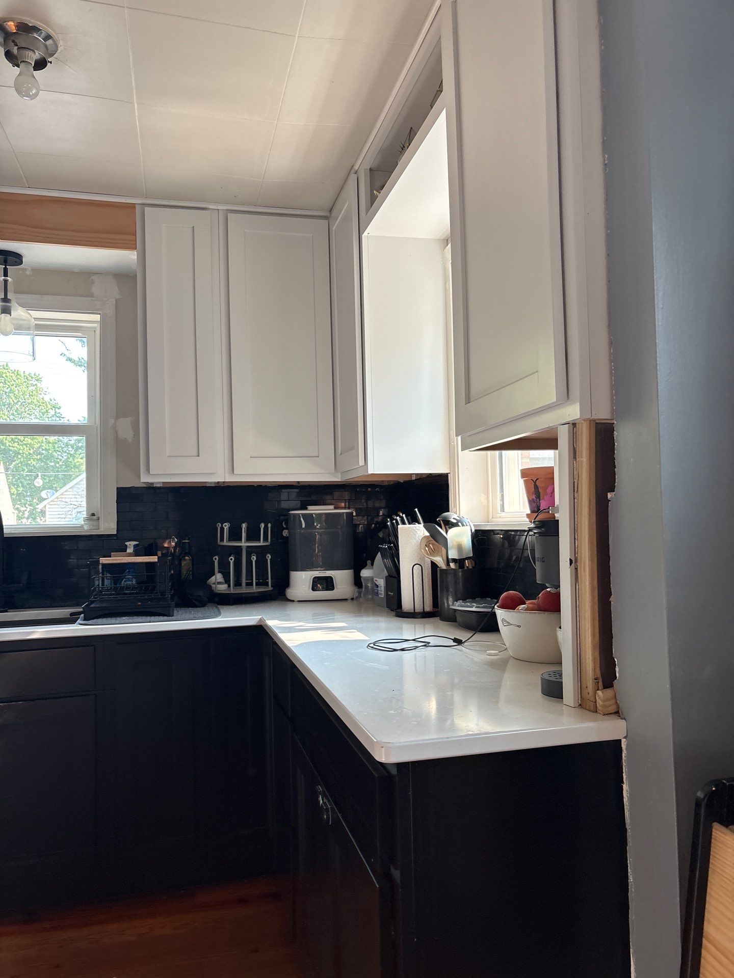 Lincoln Kitchen Remodel With Black and White Two-Tone Cabinetry by CompanyCam Sales Demo