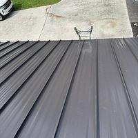 24ga 1.5" Mechanical Seam Dark Bronze by Total Roofing System The Metal Roof Experts