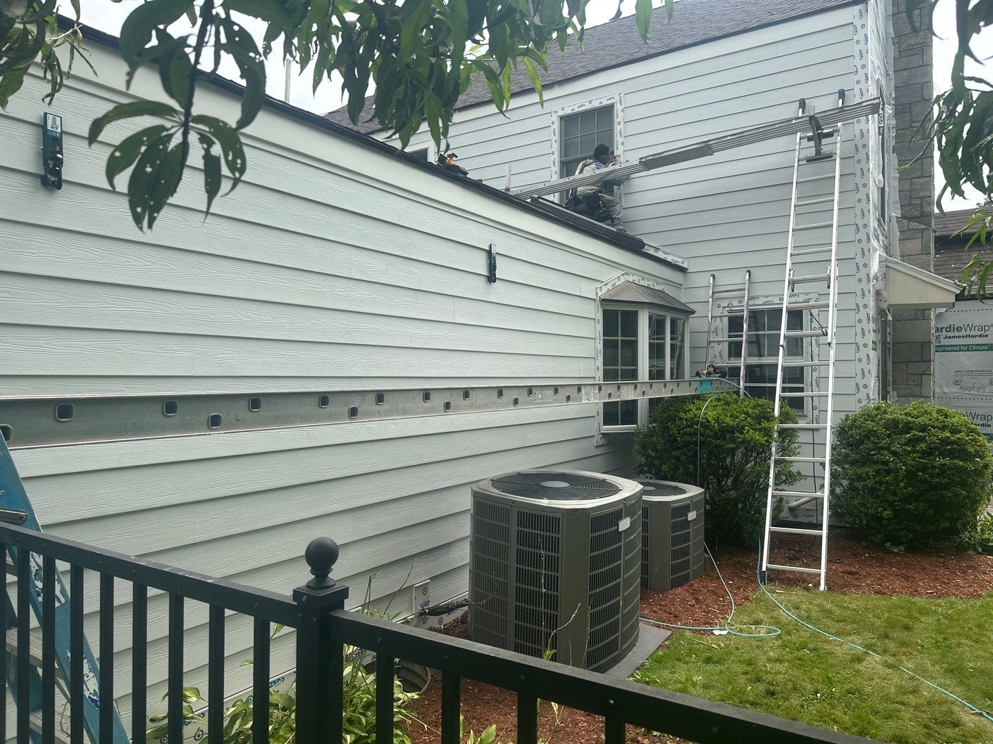 Siding Installation using Hardie Plank Artic white by A Plus Exterior