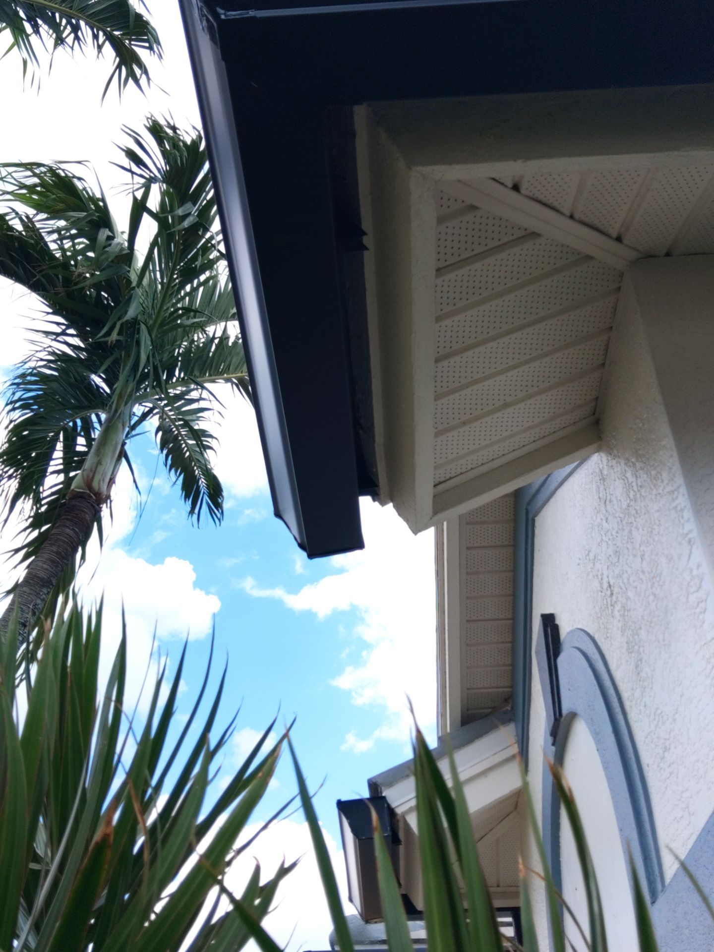 Black Seamless Gutters  by Gutter Professors