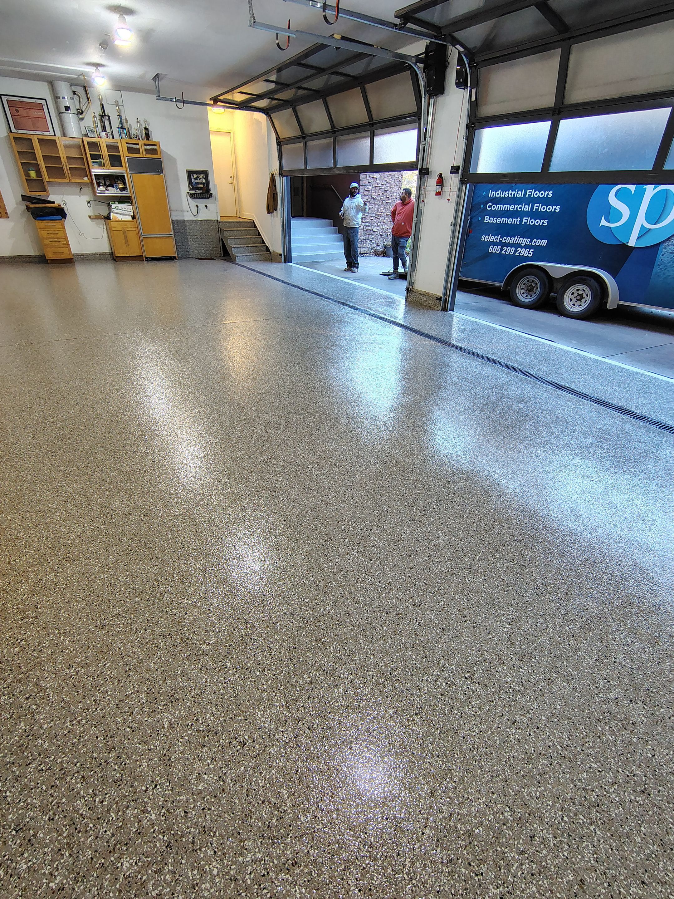 Garage Floor and Entry Step Concrete Coating in Sioux Falls by Select Painting, Coatings & Garage Cabinets
