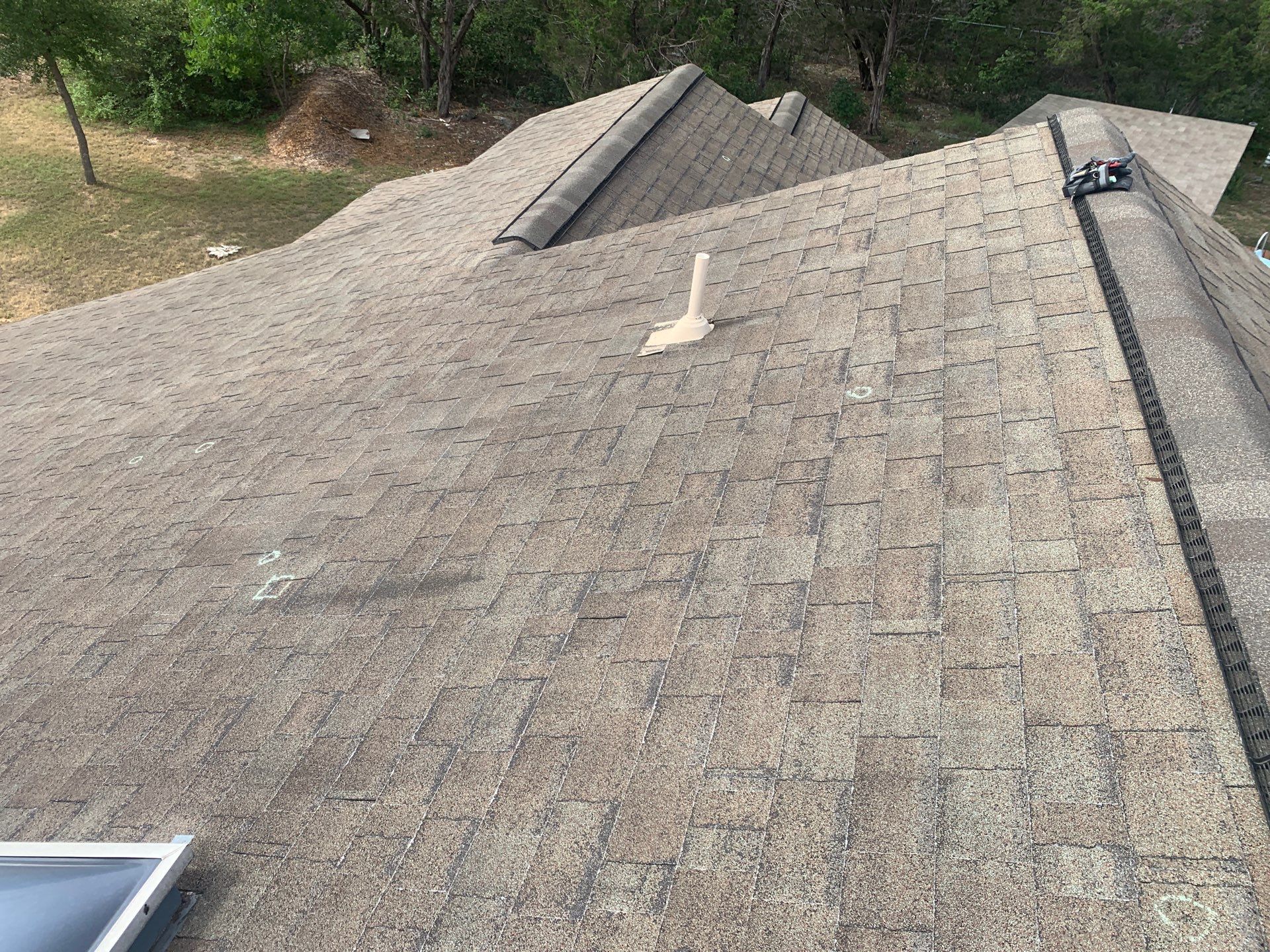 Leander Hail Damage Restoration and Architectural Shingle Roof Replacement by Caliber Restoration LLC