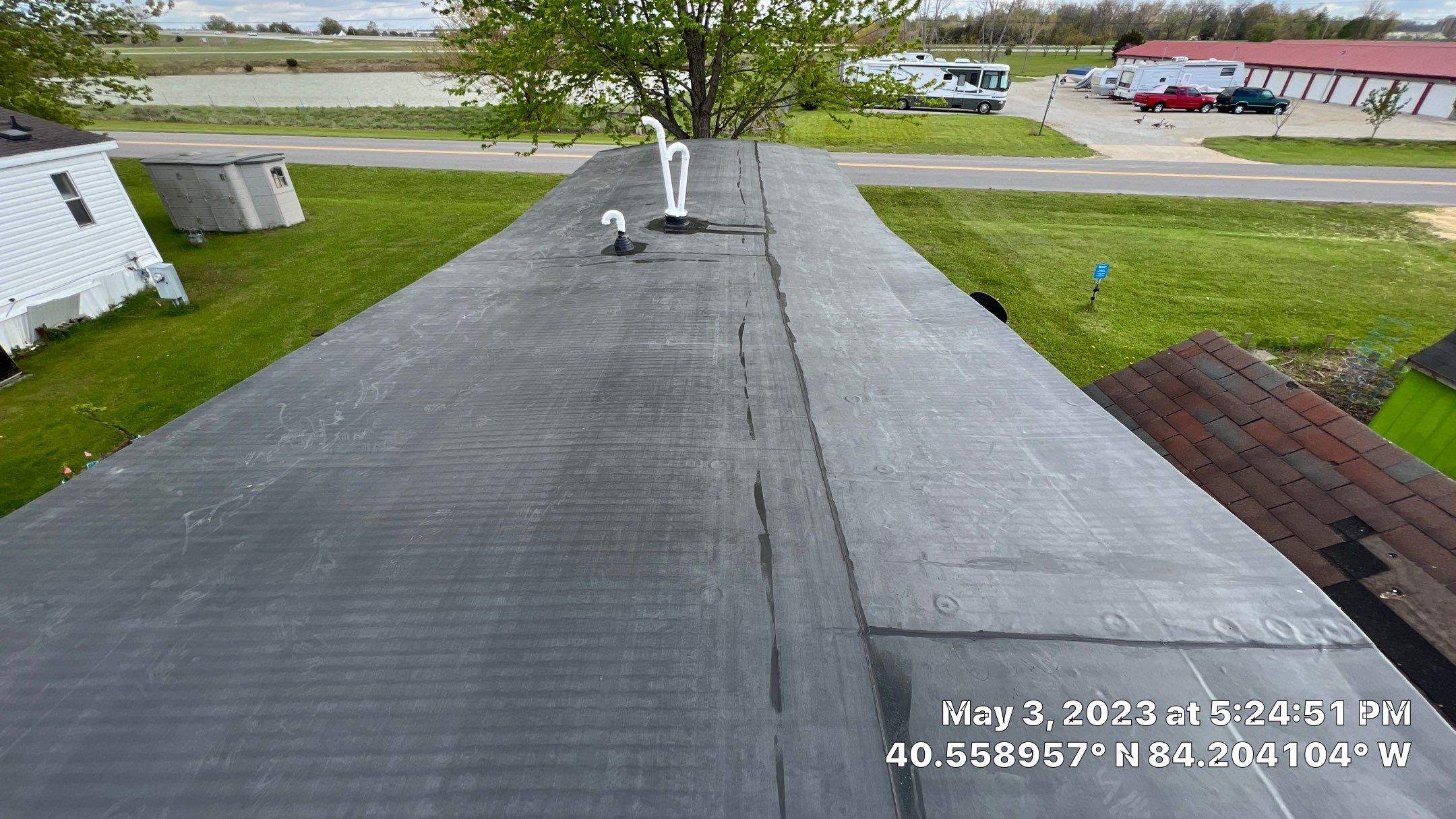 Residential Roofing Installation using 60 mil rubber roof  by Nitro Roofing and Construction
