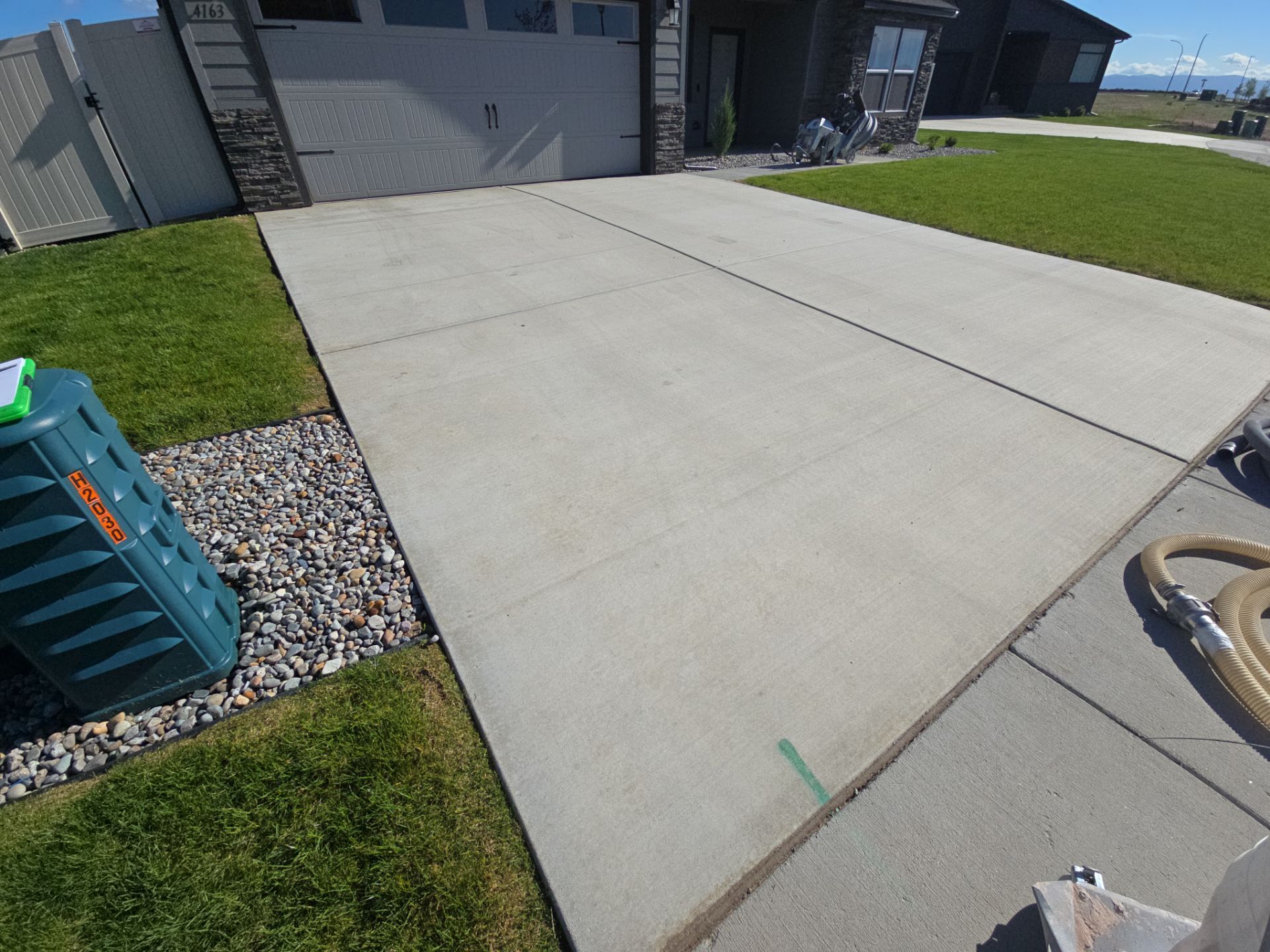 Driveway, garage, walkway Transformation using Ash Hybrid by Croc Coatings, LLC