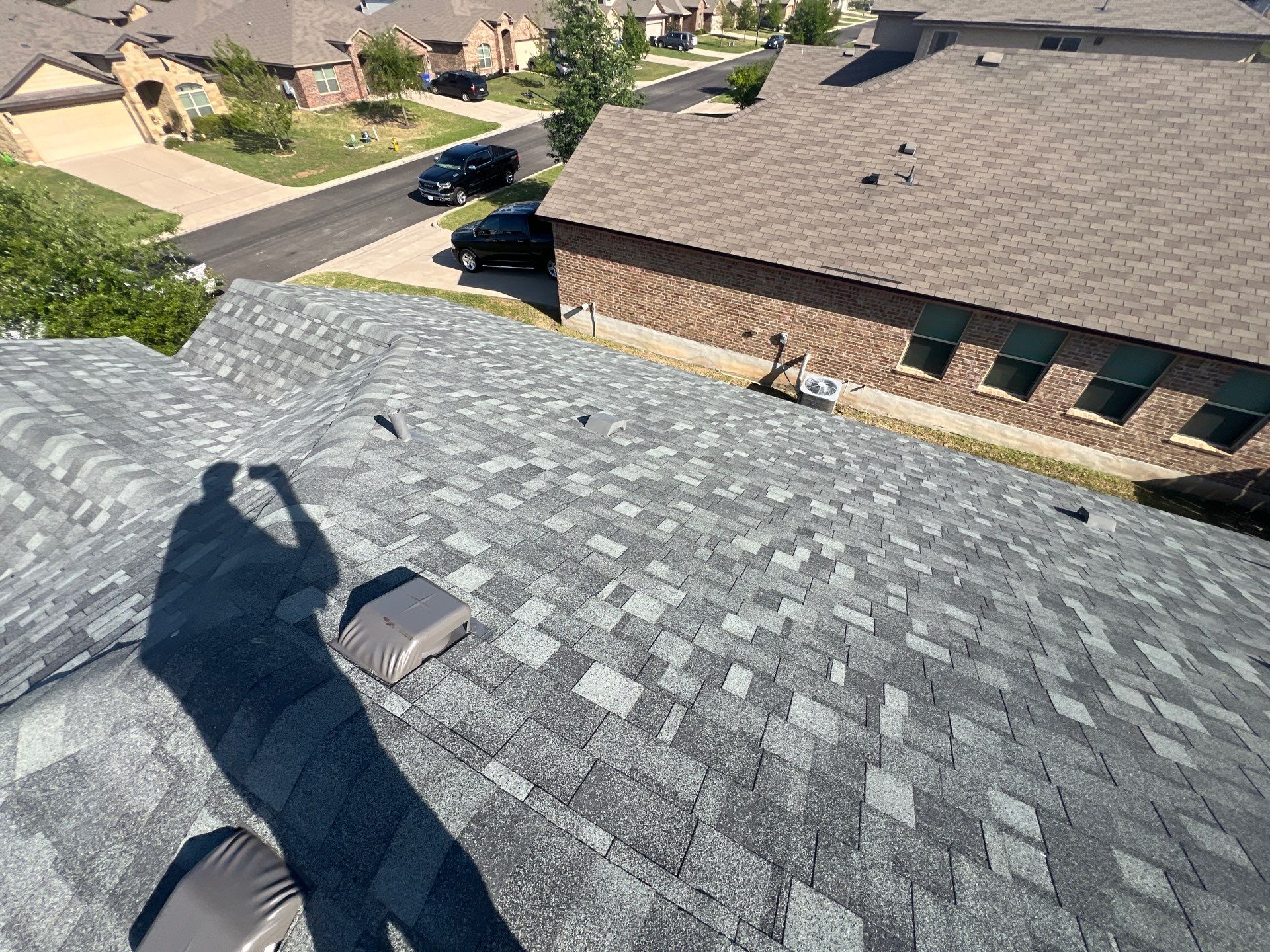 Residential Roofing Installation using IKO Nordic Class 4 Impact Resistant 30yr Architectural Shingles. Color: Castle Grey by WR Roofing Solutions