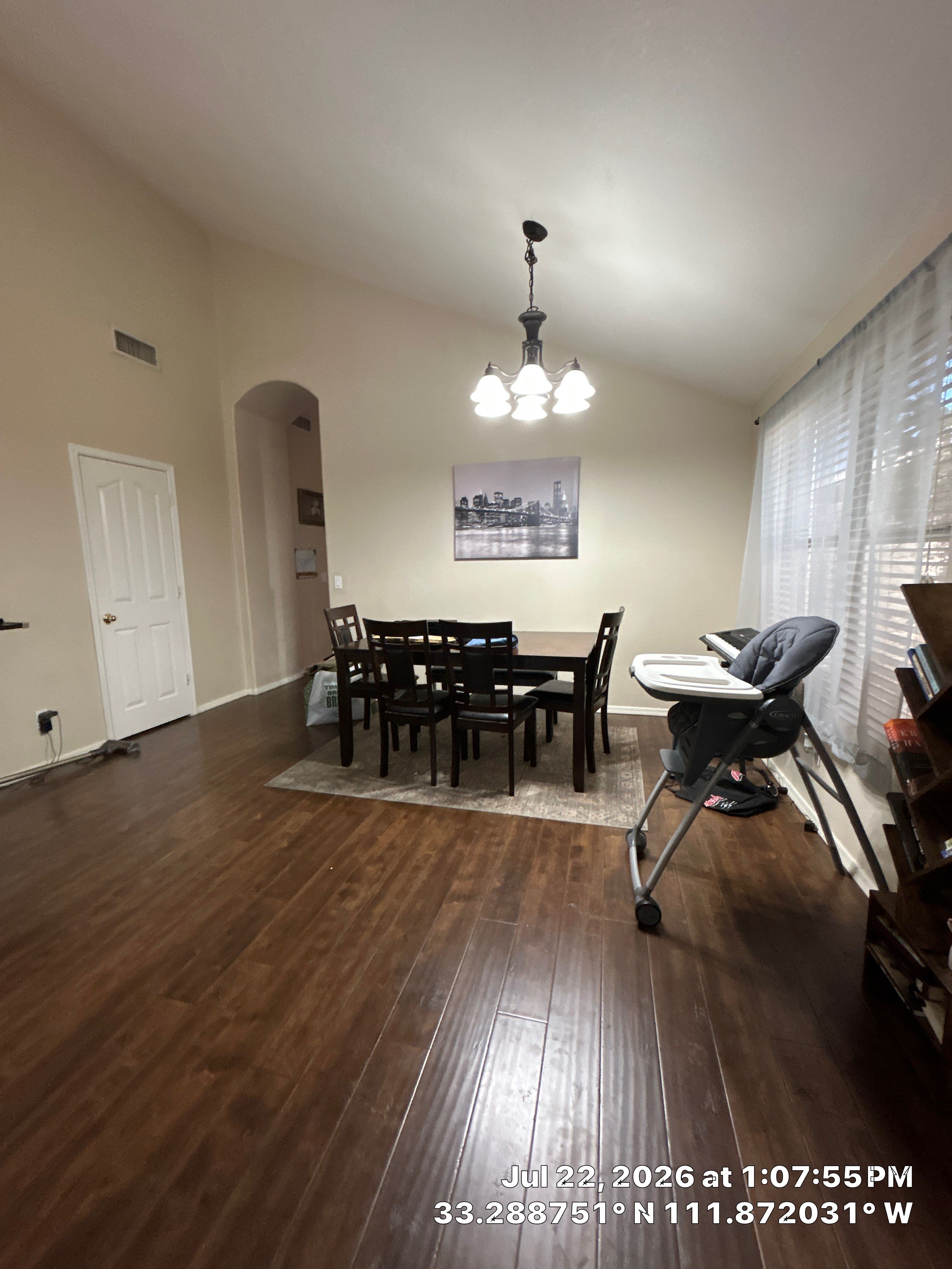 Interior Remodel Featuring Dark Wood Flooring in Chandler by CompanyCam Sales Demo