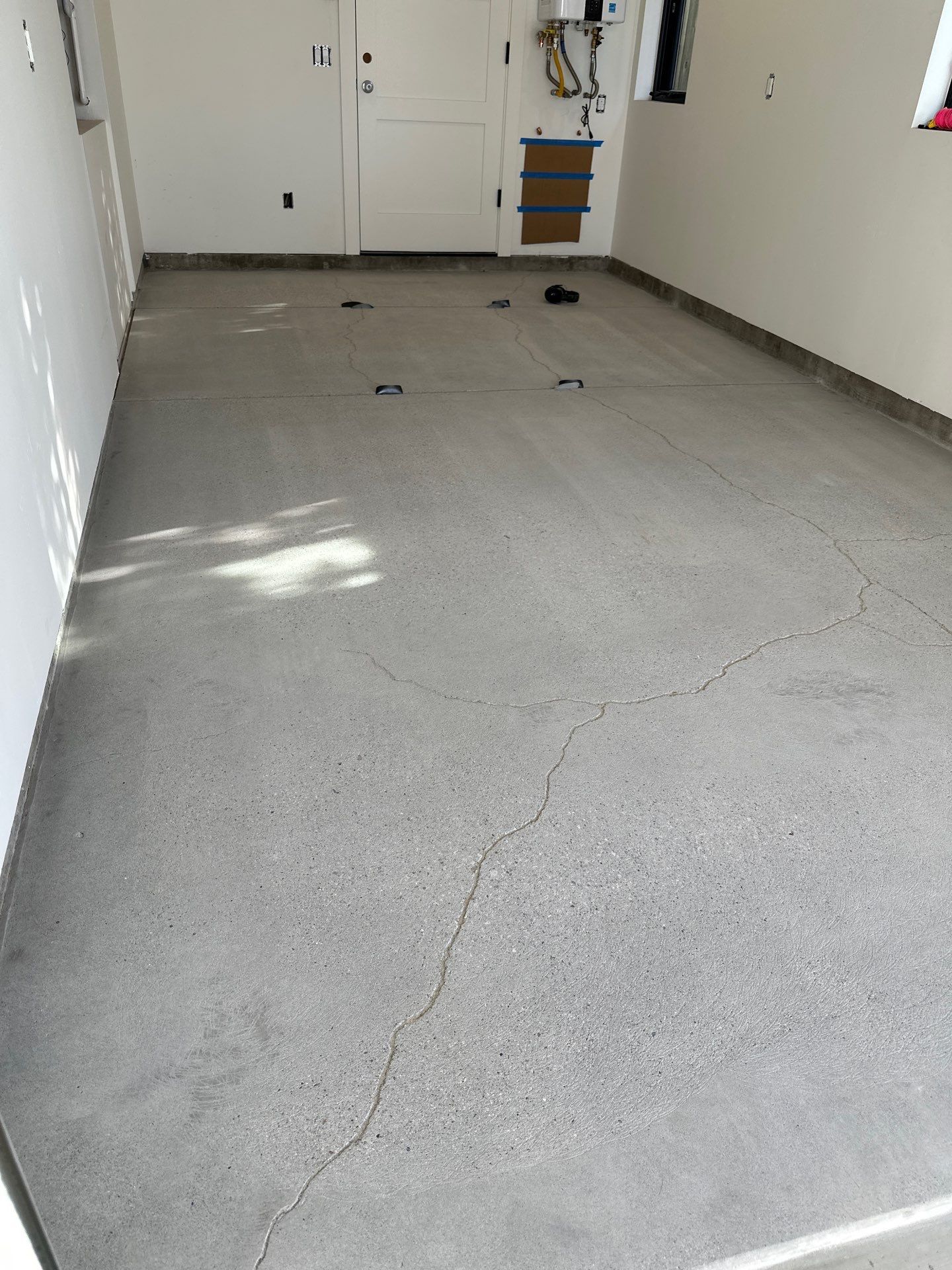 Cayucos Garage Floor Epoxy Installation with Moisture Vapor Barrier by MGP Coatings