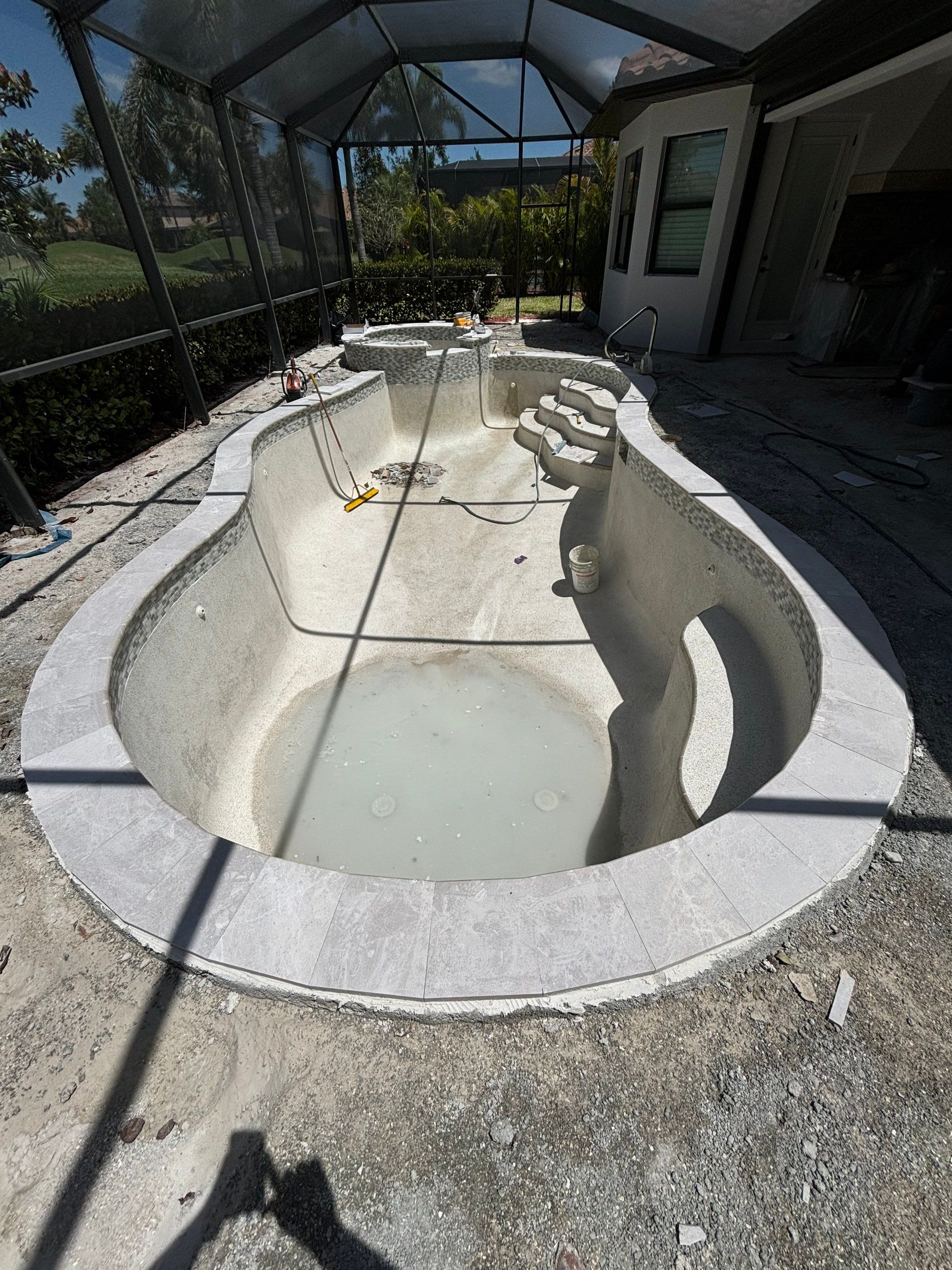 Textured Marble Pool Deck - Bonita National Golf & Country Club by Old Town Pavers Llc