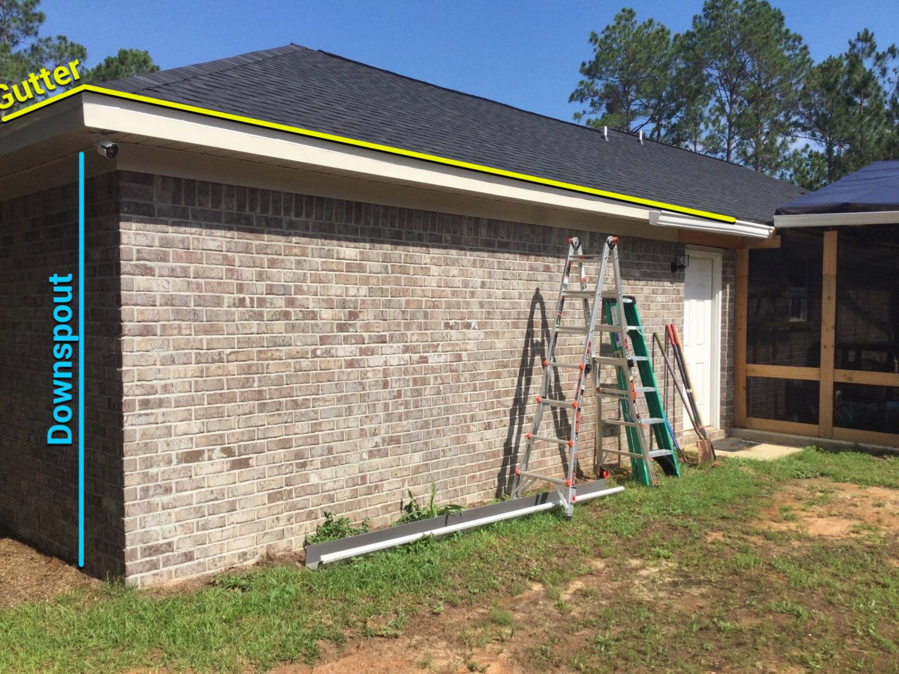 Downspout Installation using White Down Spouts in Milton FL by Gutter Professors