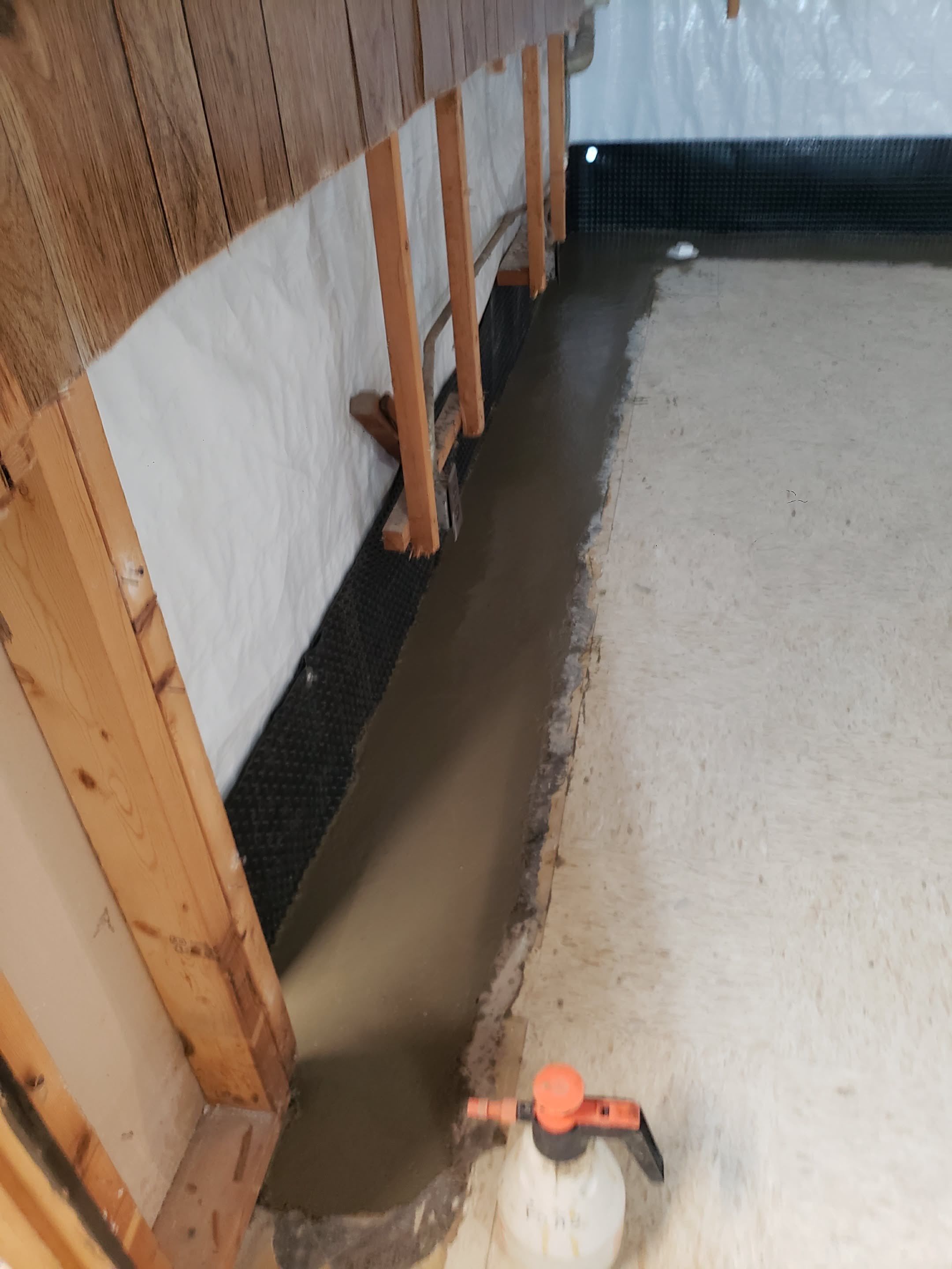 Interior Drain Tile System- Chicago by Area Wide Waterproofing