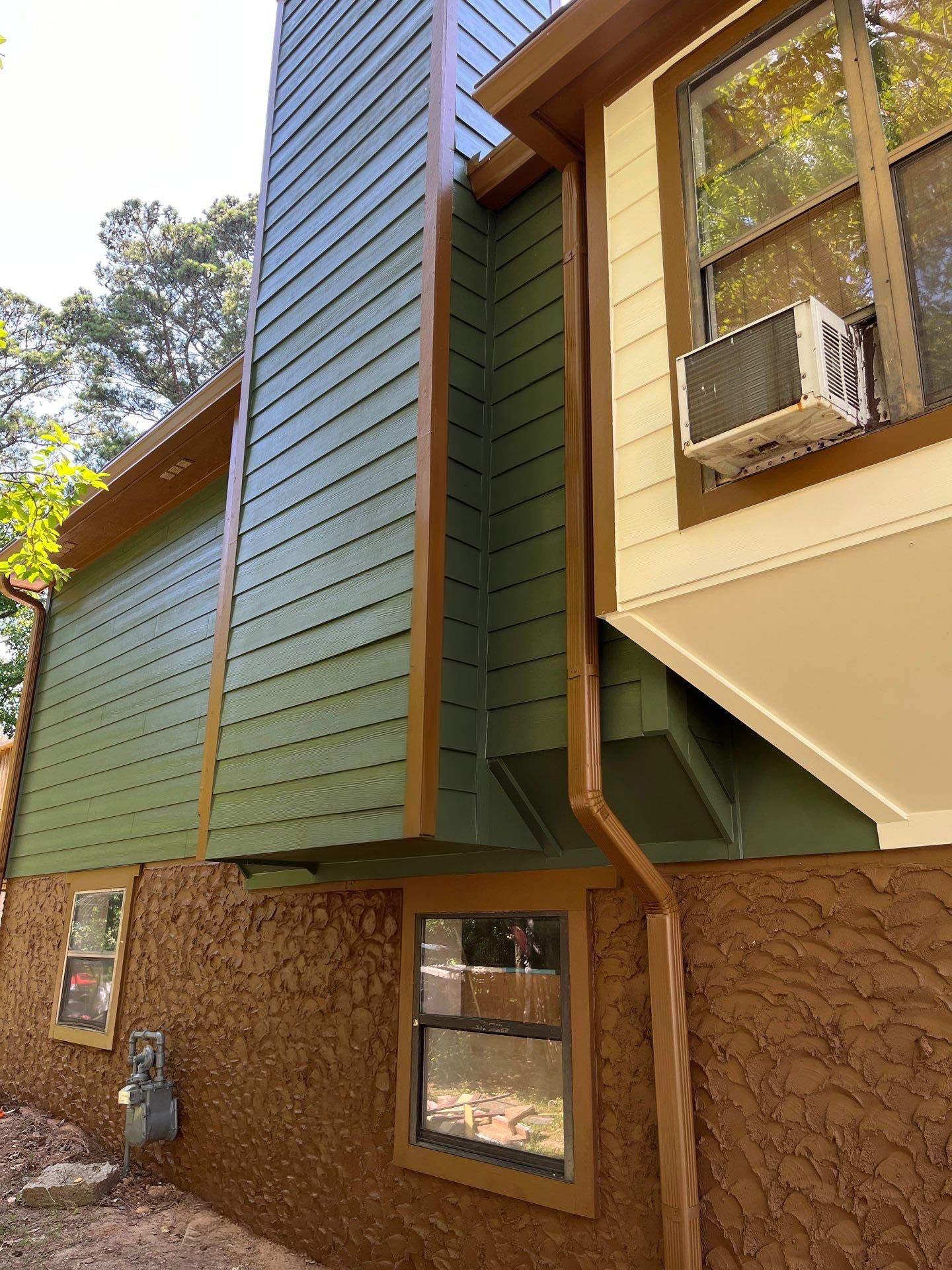 Snellville,GA Siding Replacement and Multi-Colored Exterior Painting by Nelson Exteriors