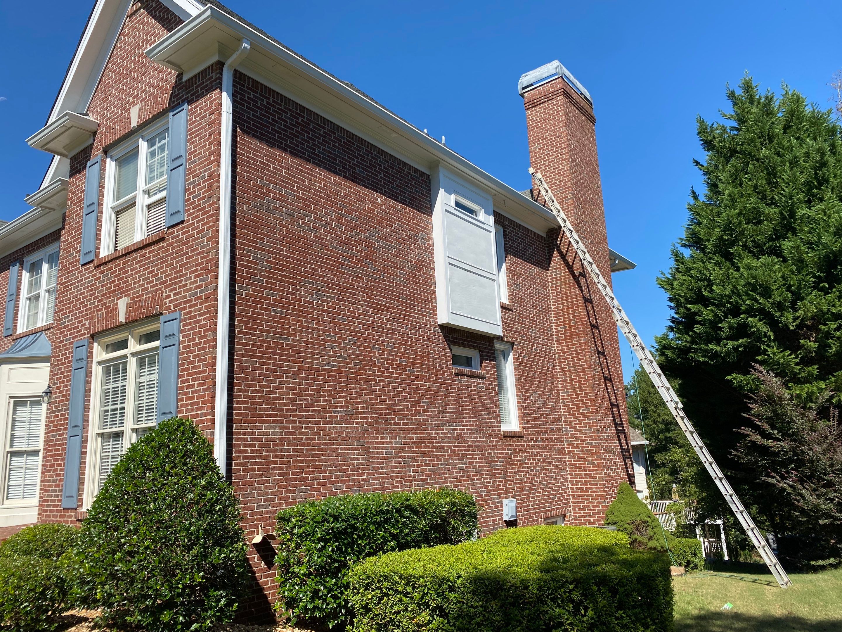 Exterior Painting and Trim Refresh for Duluth Brick Home by Swift Home Renovations