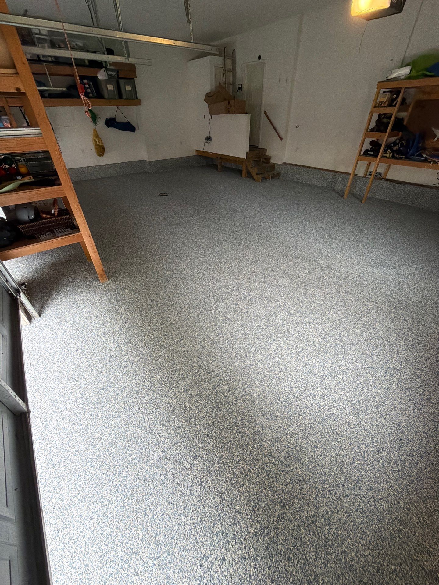 Custom Tidal Wave Epoxy Flake Floor Installation in Norton Shores. by Gordon Painting
