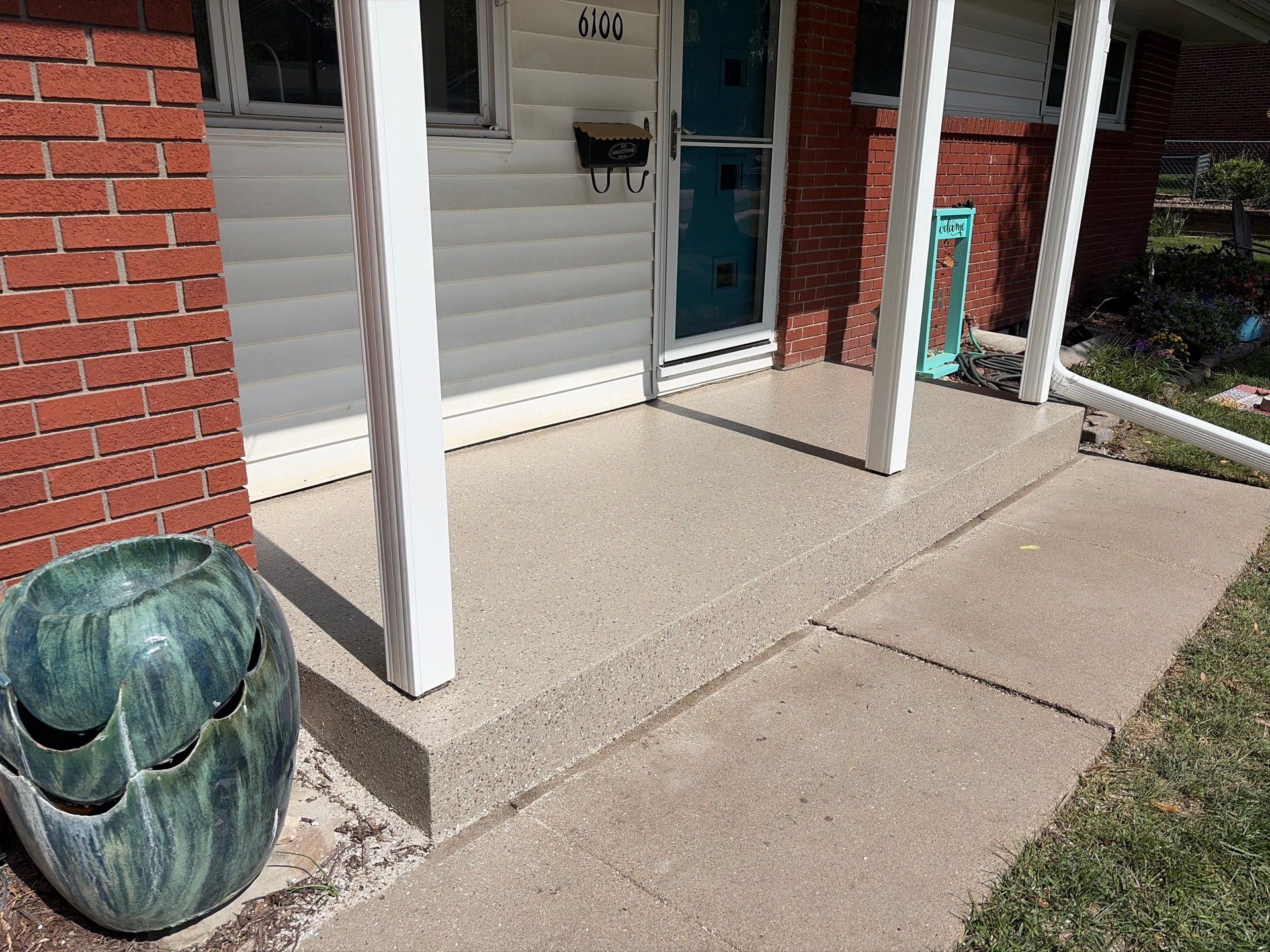 Lincoln Front Porch Restoration with Hybrid Flake Coating by Goat Coatings