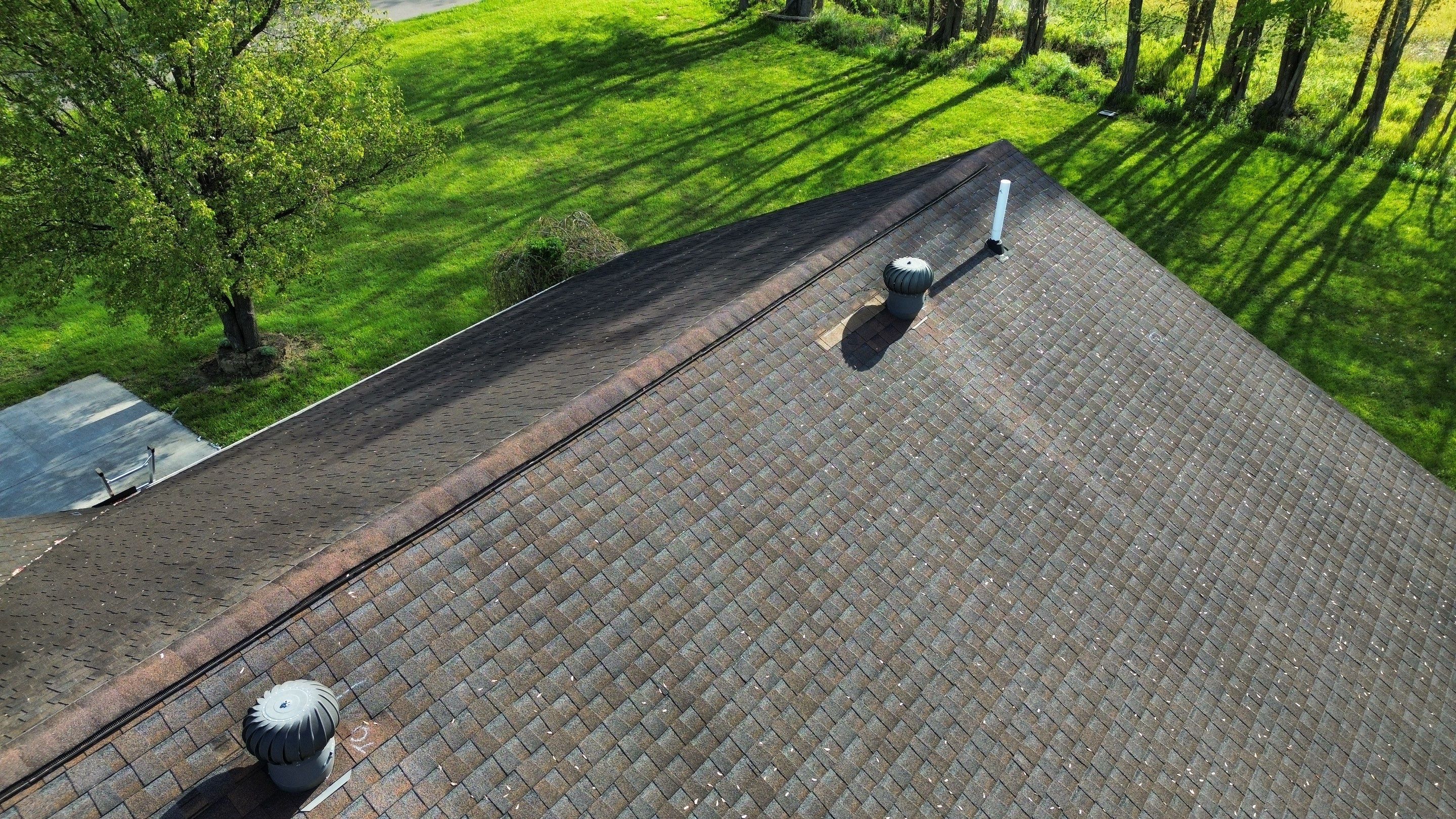 Residential Roofing Installation using Performance Panel Metal - Coca Brown by RoofX 