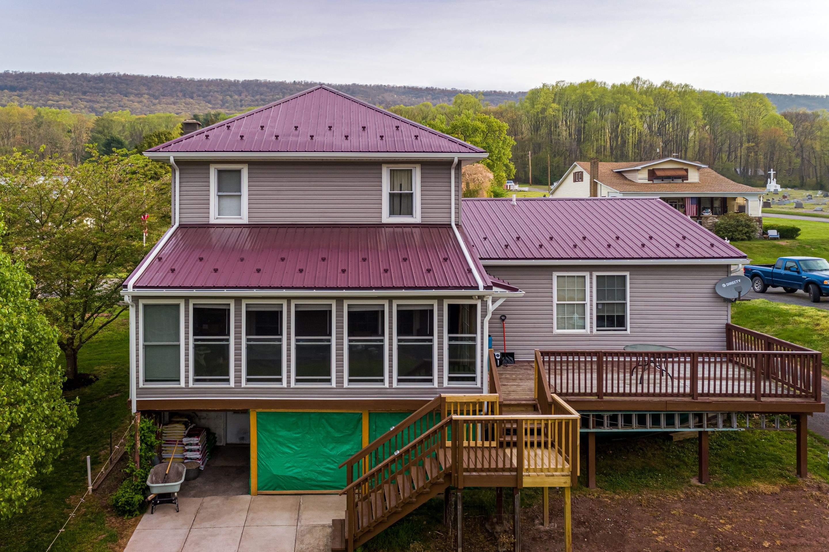 Metal Roof-burgundy by Esh Builders