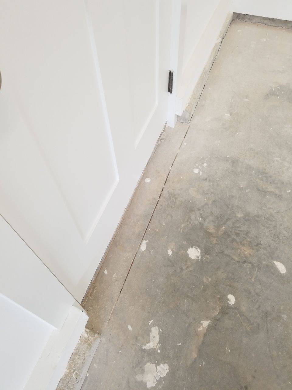 Garage Floor in Sandstone by Spectrum Painting, LLC