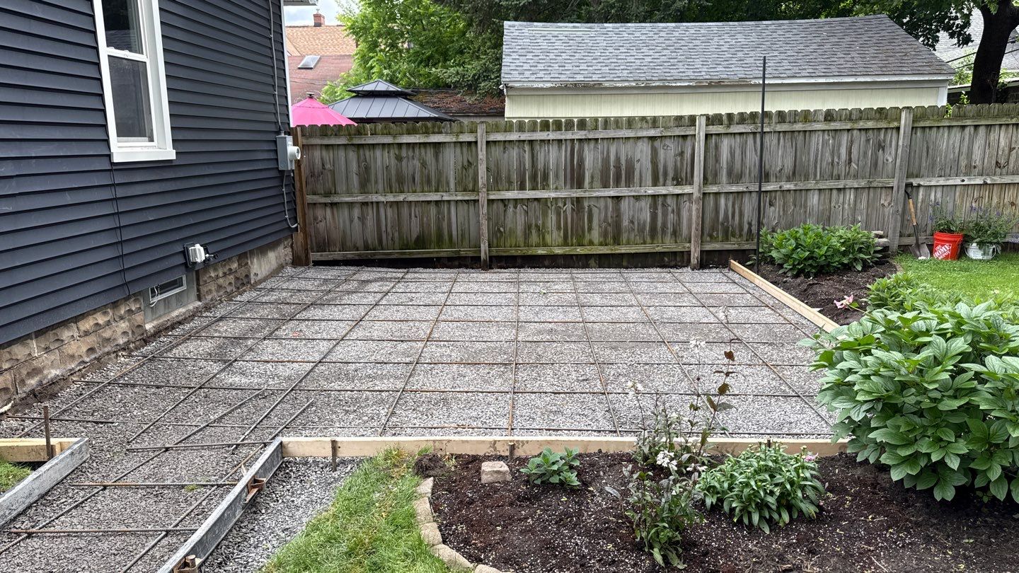 Oxford slate stamped patio and walkway  by NG Masonry & Construction LLC