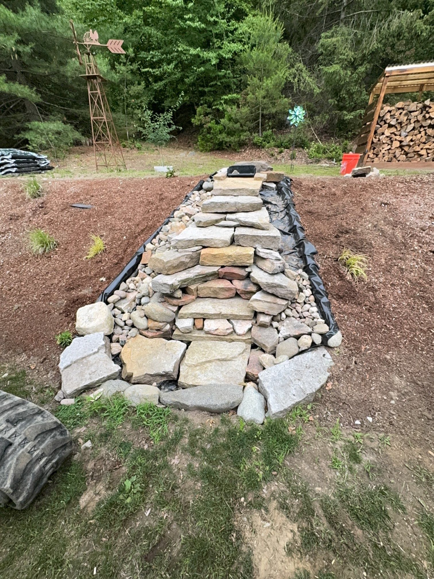Complete Rebuild of a Pondless Waterfall in Palmer by Wicked Water Gardens