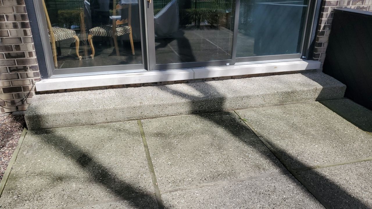 Aggregate concrete cleaning and sealing using Surebond SB-9000 by Northern Power Washing LLC.