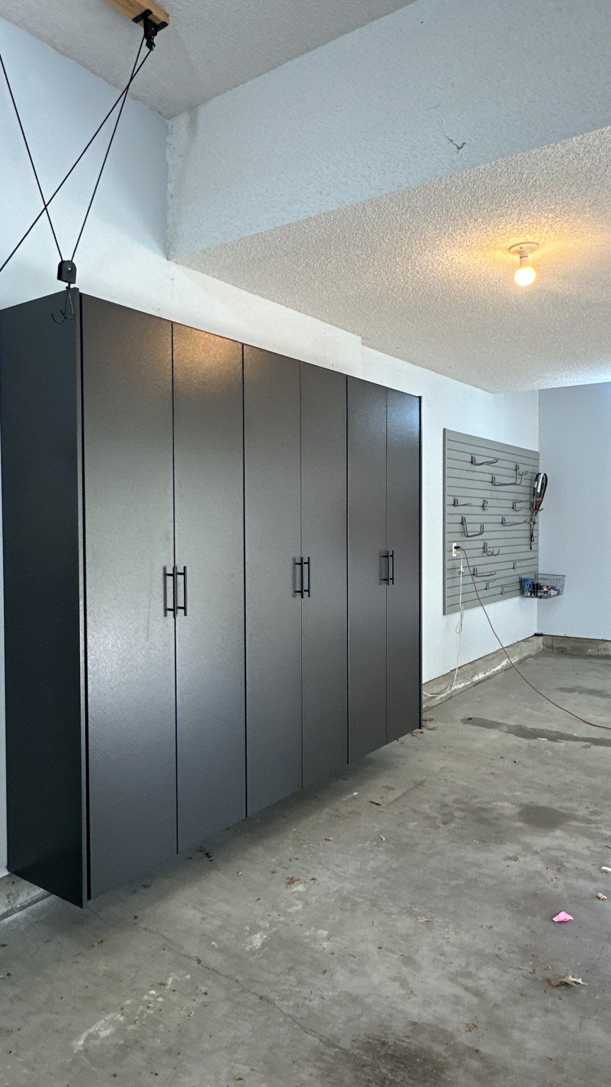 Shawn S. upgraded his garage with cabinets and slatwall  by Banner Garage