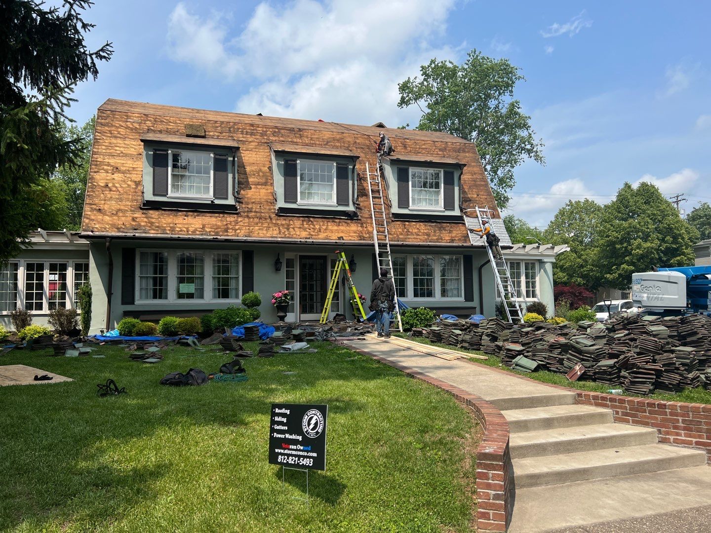 Slate removal/Cedar Shake replacement by Storm Contracting 