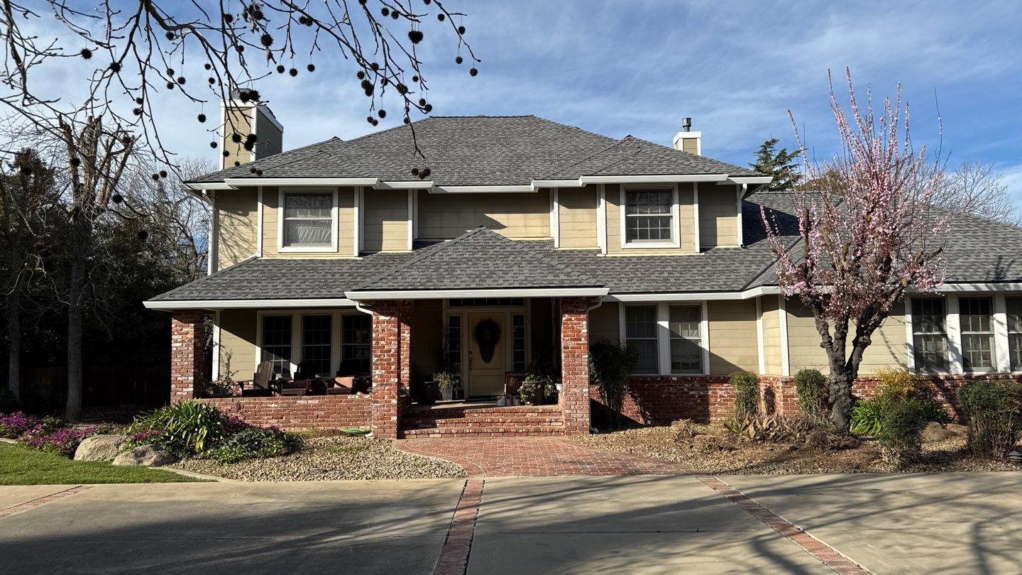 New shingles and gutters using GAF Timberline HDZ shingles and aluminum gutter by Straight Edge Roofing Inc
