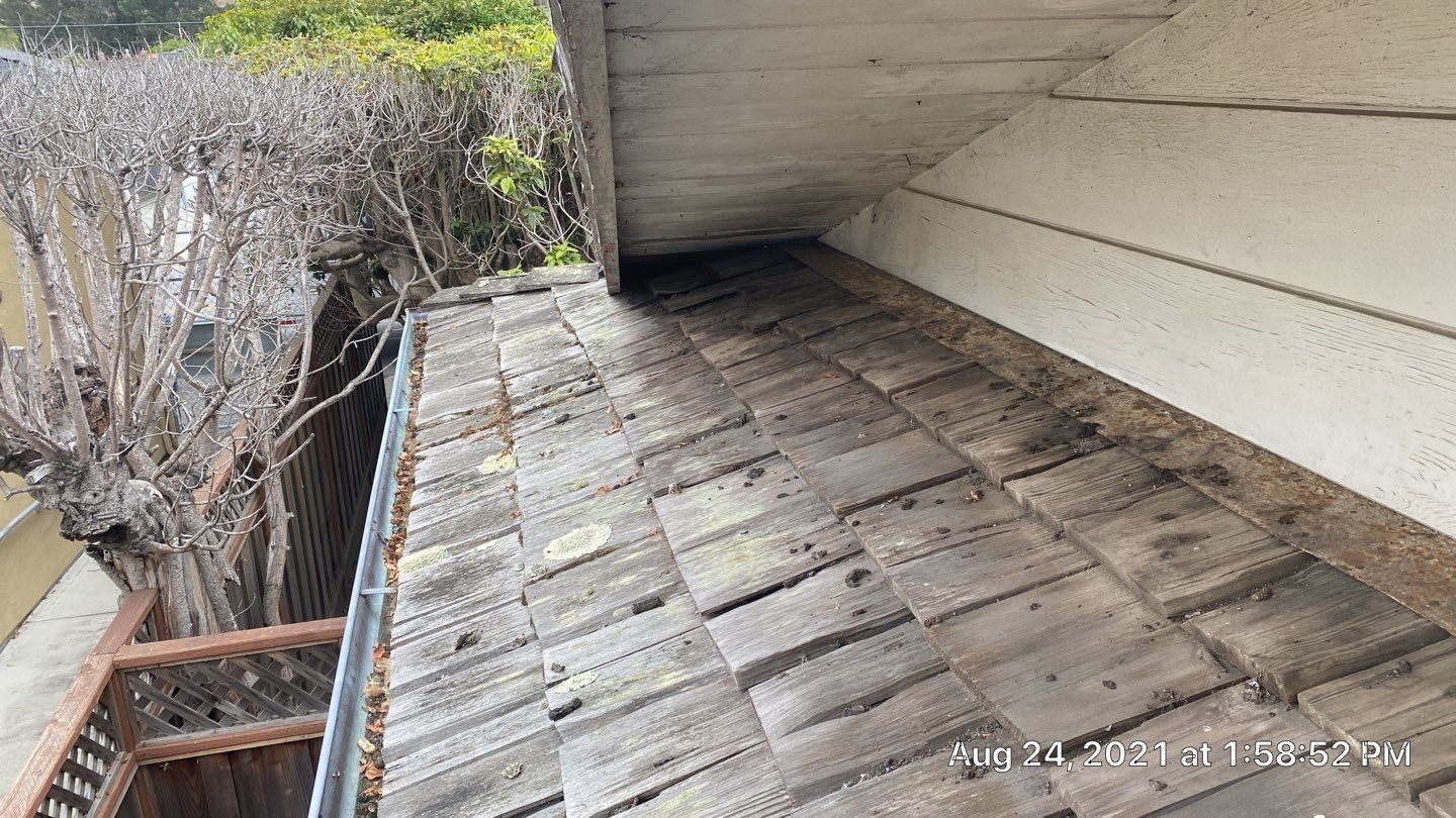 Refurbish and repair shake roof to get ready to sell by Straight Edge Roofing Inc