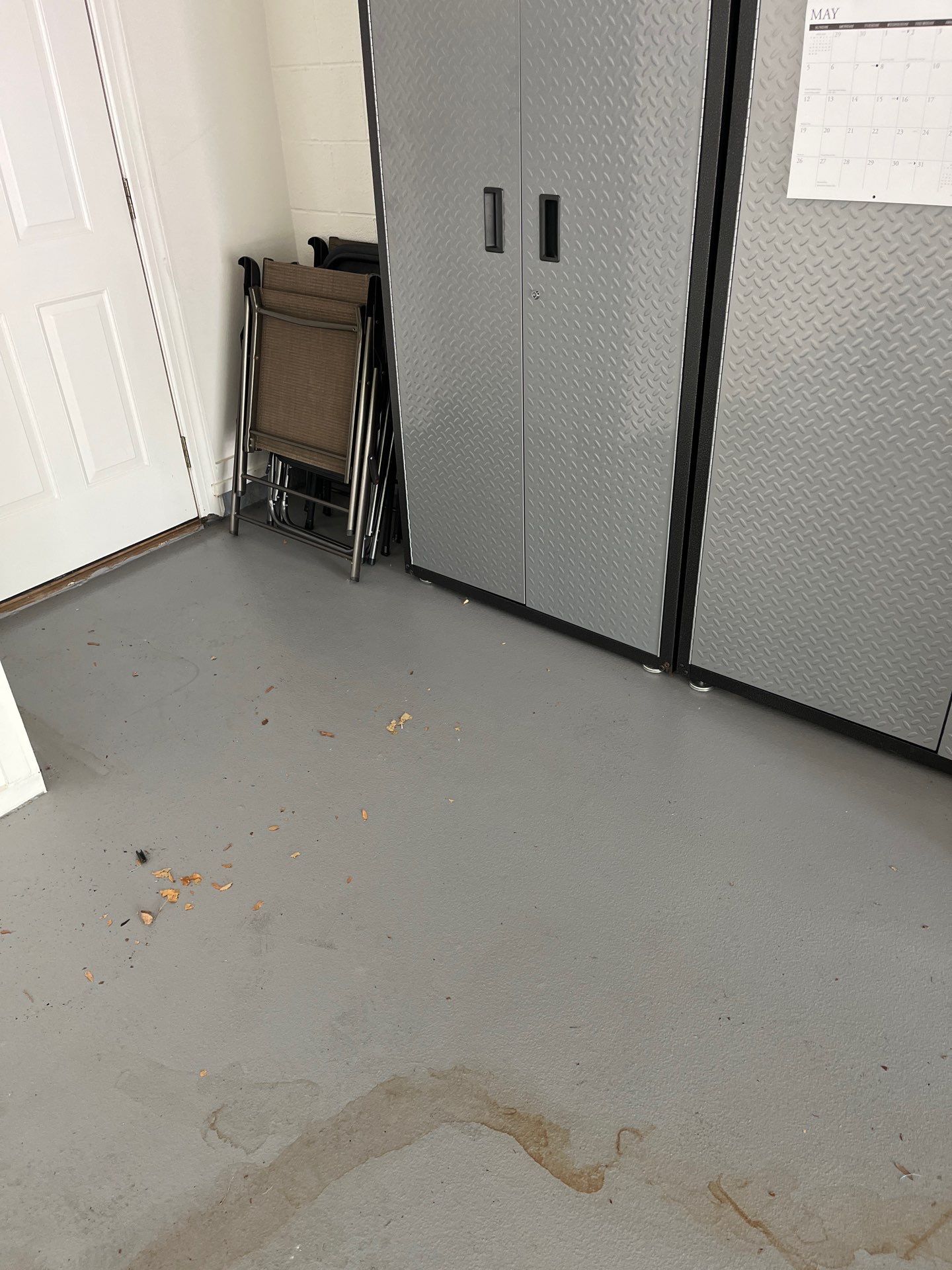epoxy garage floor cleaning using degreaser by Northern Power Washing LLC.