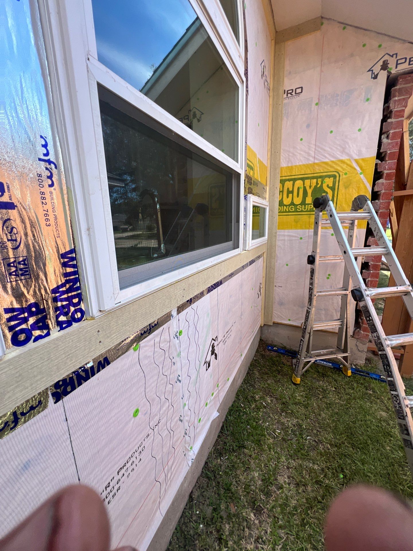 Windows with a side of Siding by Bayfront Roofing and Construction