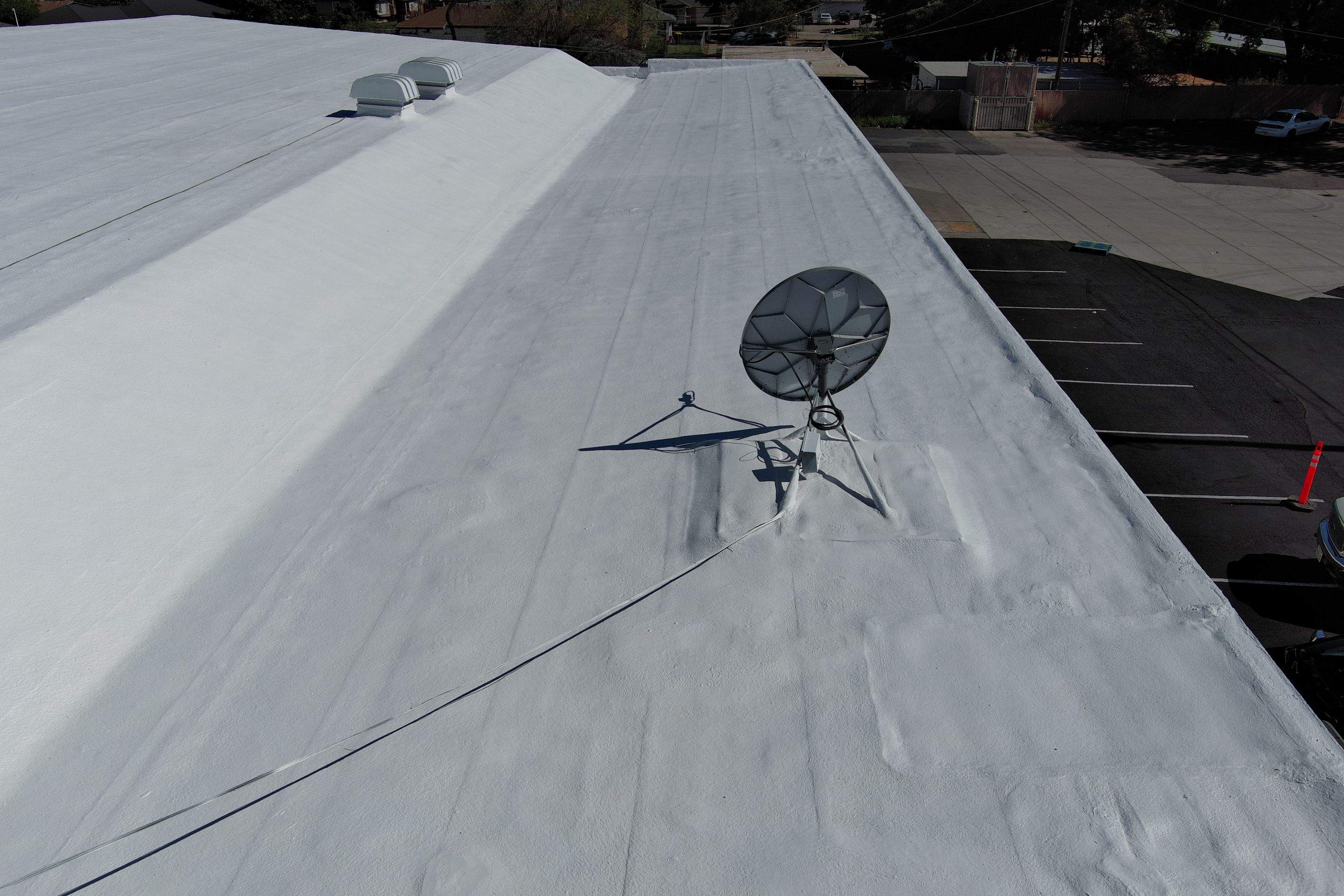 Foam Refurbish using Conklin Benchmark/PUMA XL coatings and spray foam by Straight Edge Roofing Inc