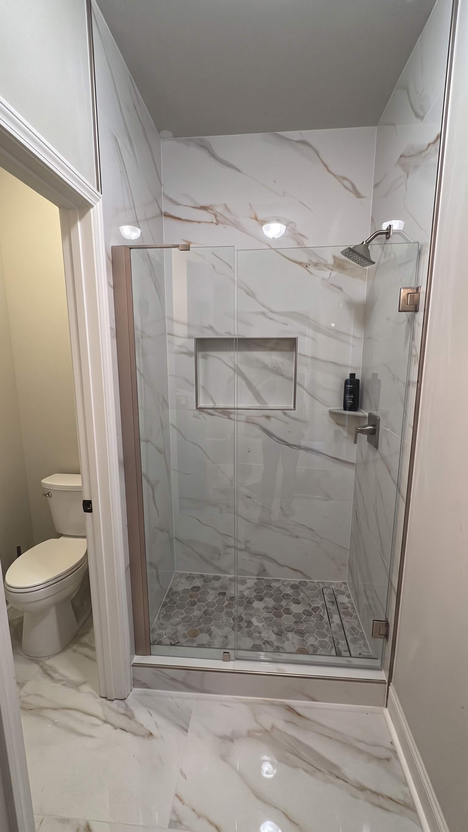 Three showers renovation by Prudencio