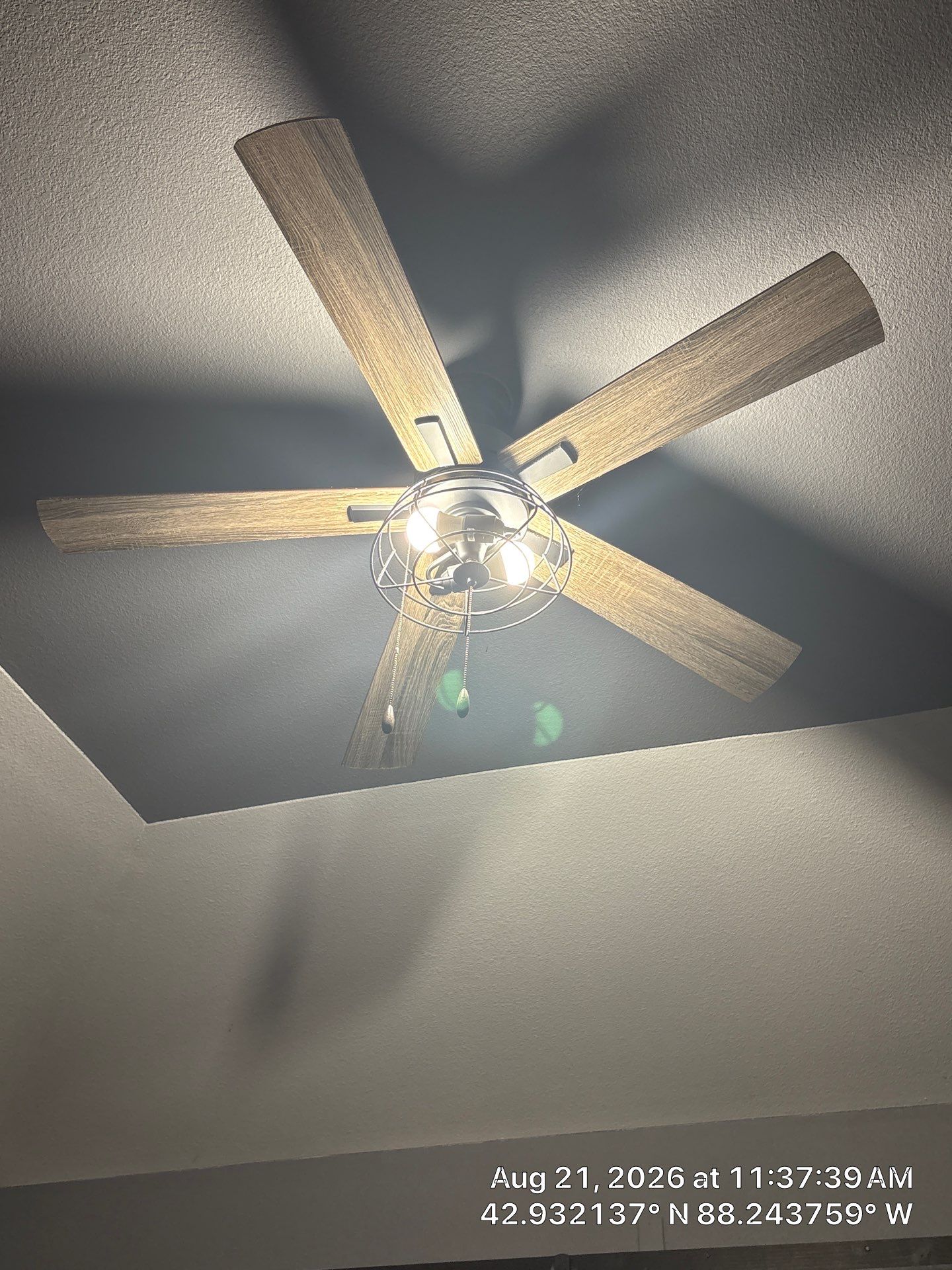 Dark Sliding Barn Door and Caged Light Ceiling Fan Installation in Waukesha by CompanyCam Sales Demo