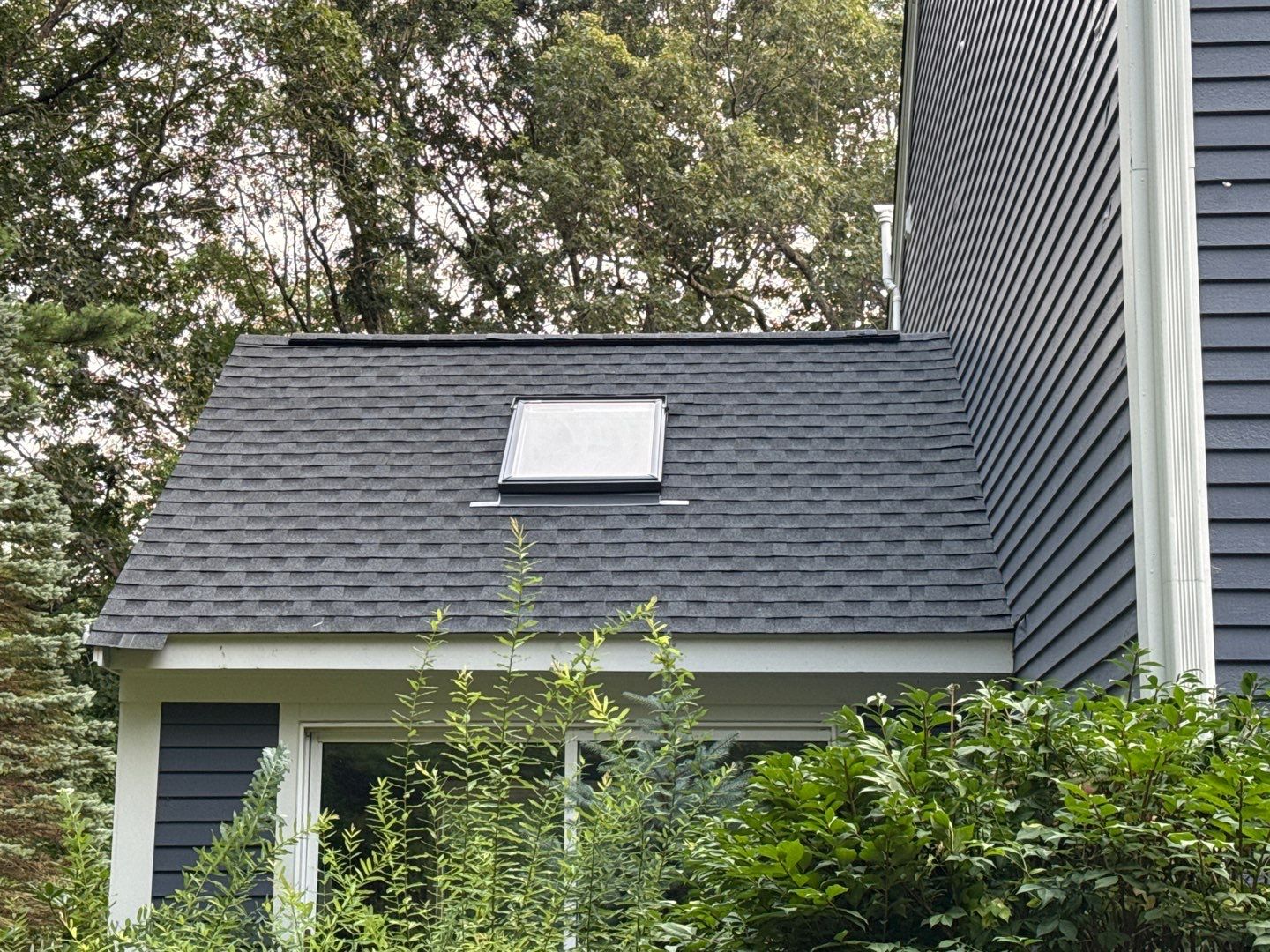 Solar-Ready Roof Replacement with GAF Pewter Gray Shingles & VELUX Skylights by Sensible Home Solutions